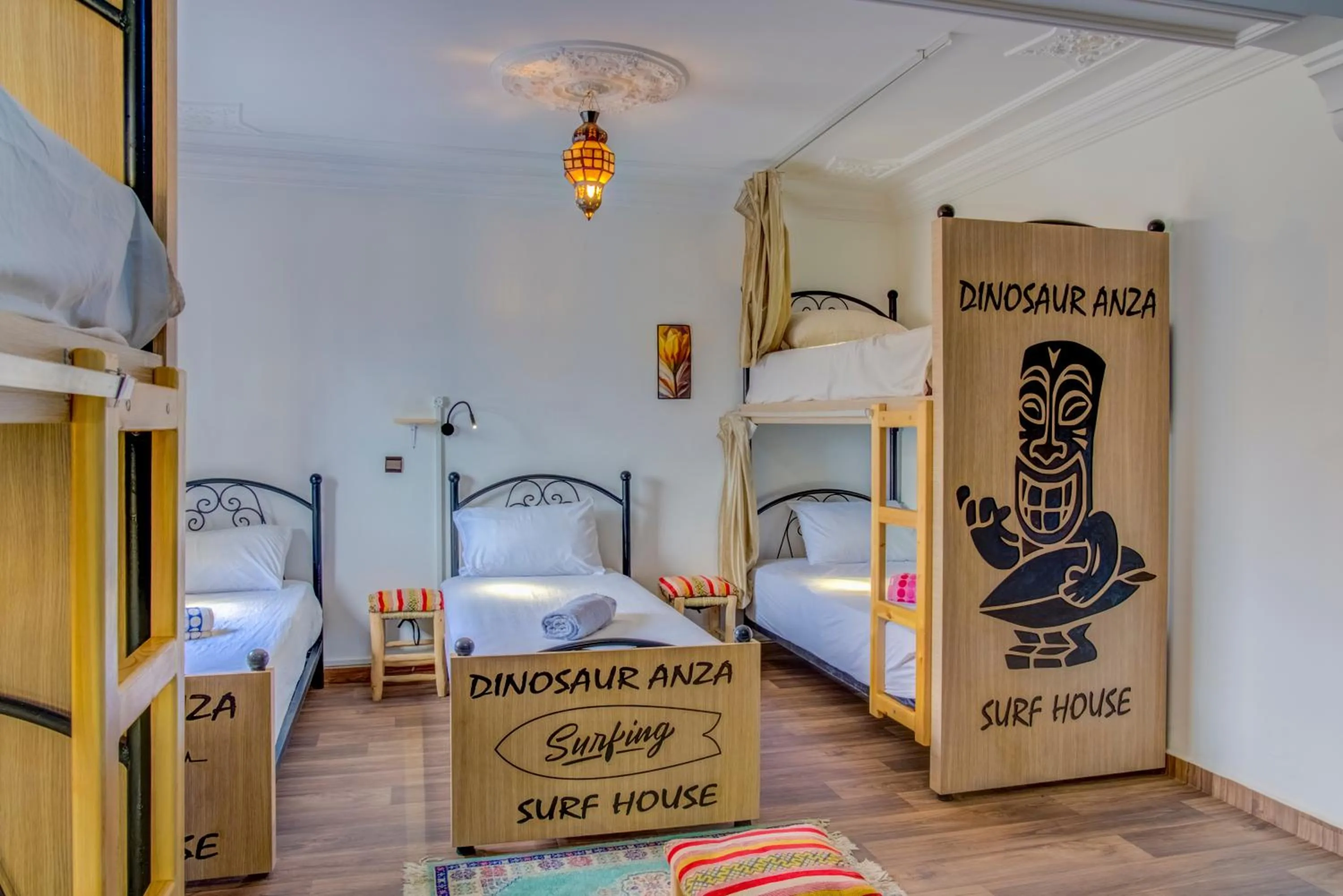 Bed in Dinosaur Anza Surf House