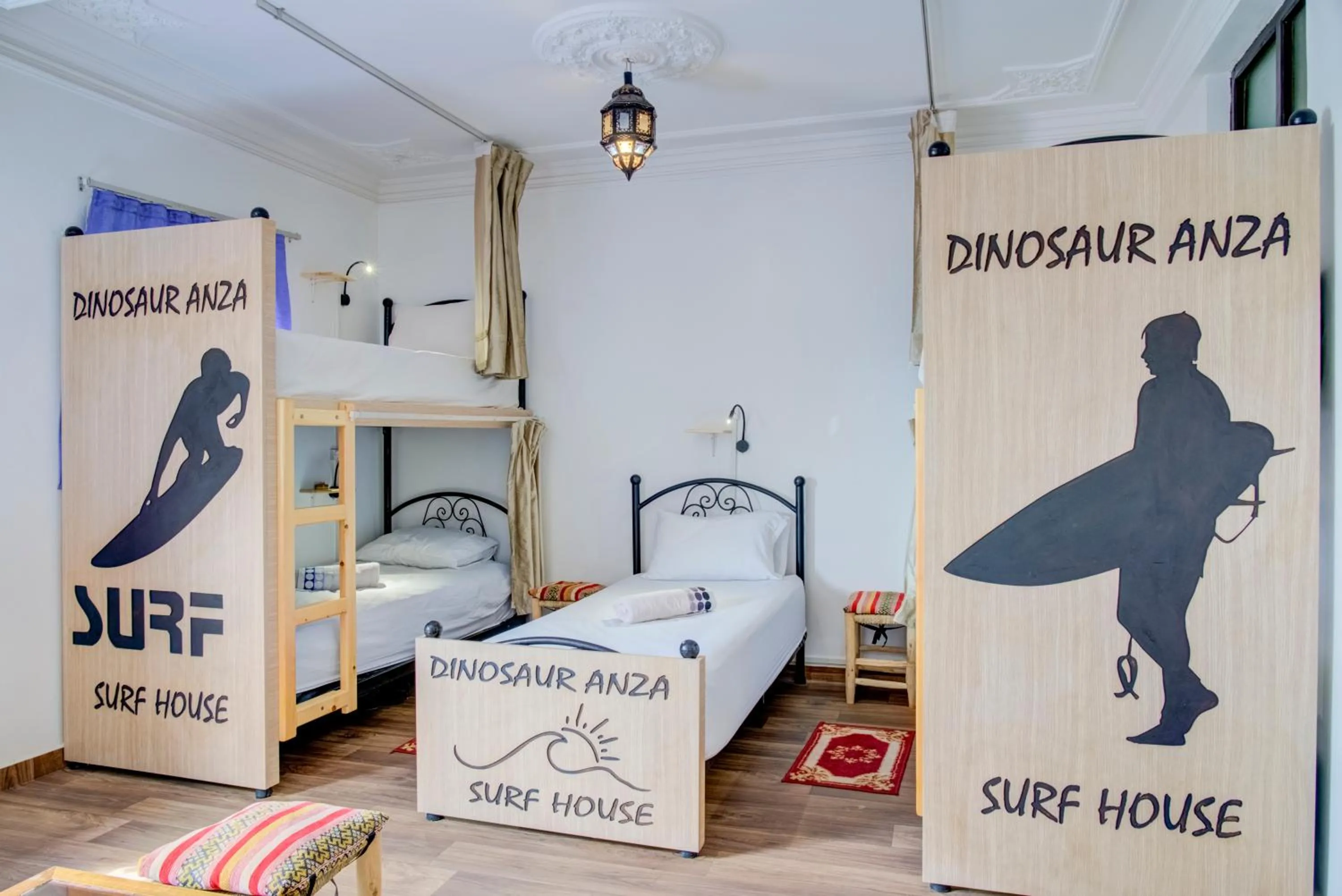 Bed in Dinosaur Anza Surf House