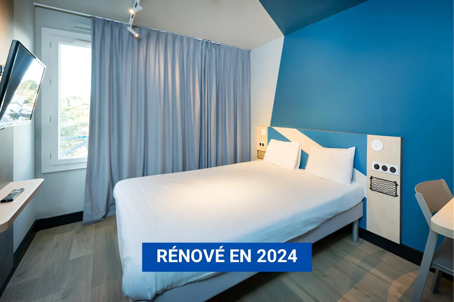 Bed in Ibis Budget Lyon Caluire Cité Internationale