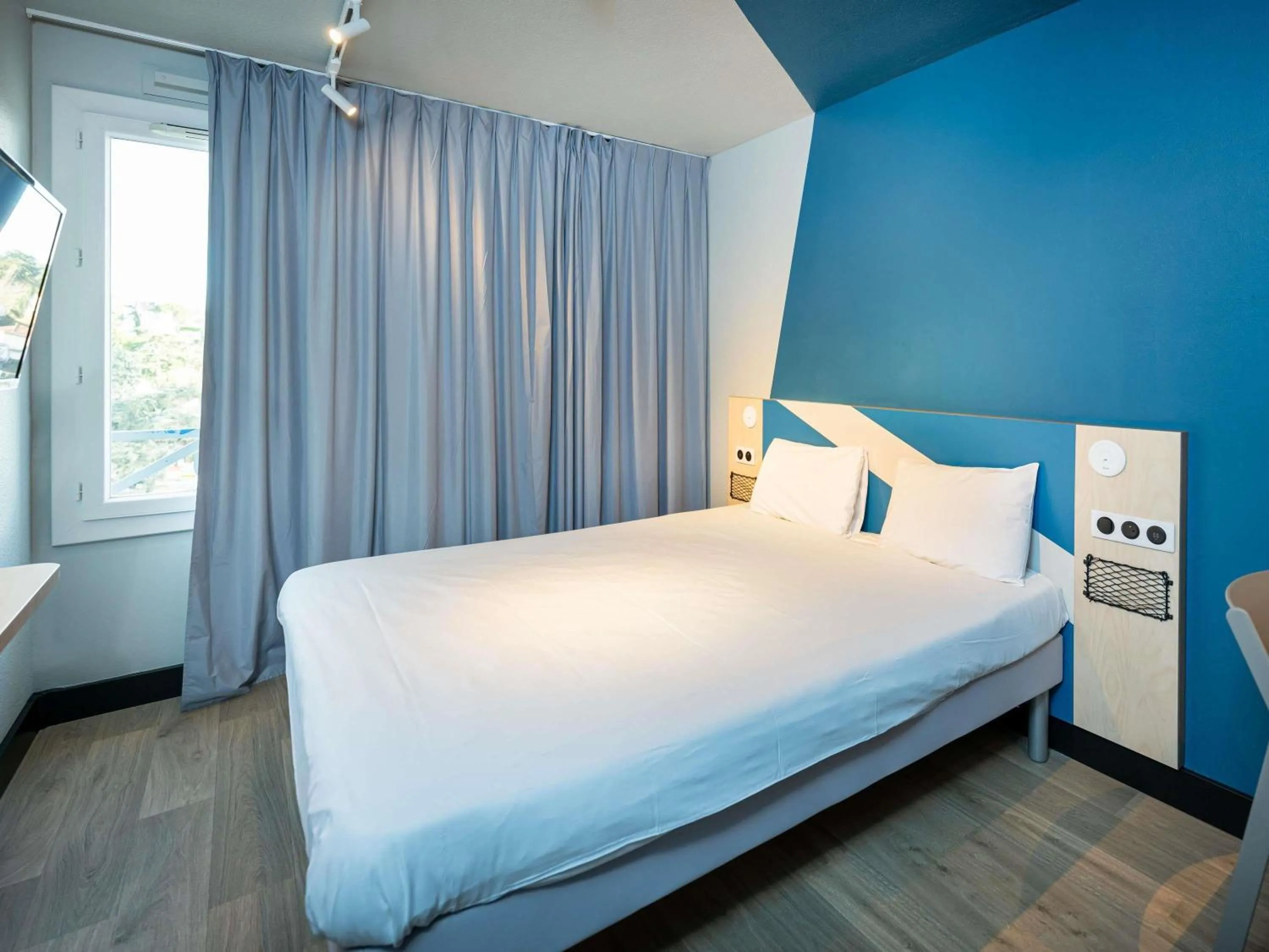 Bedroom, Bed in Ibis Budget Lyon Caluire Cité Internationale