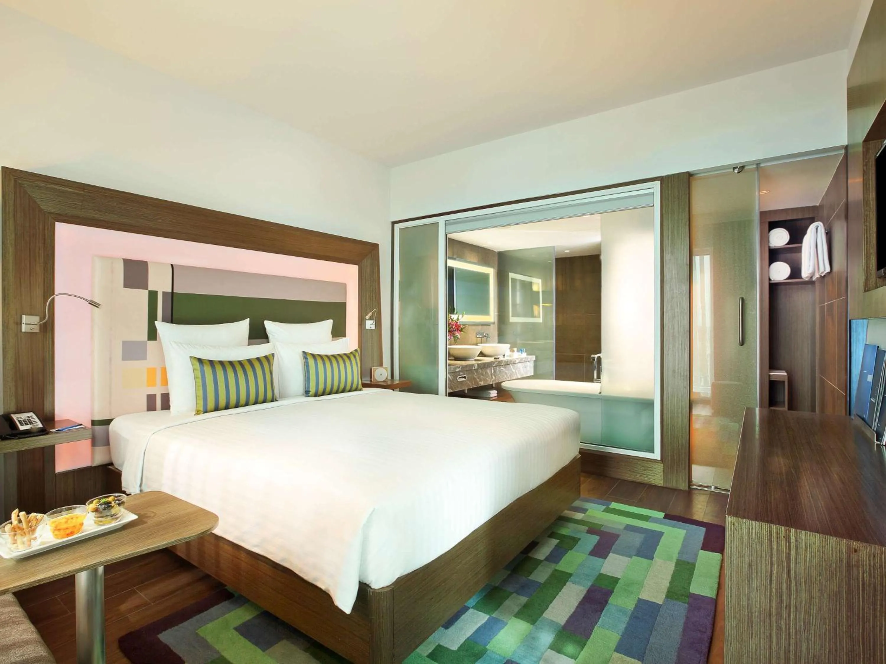 Photo of the whole room, Bed in Novotel Chennai Sipcot