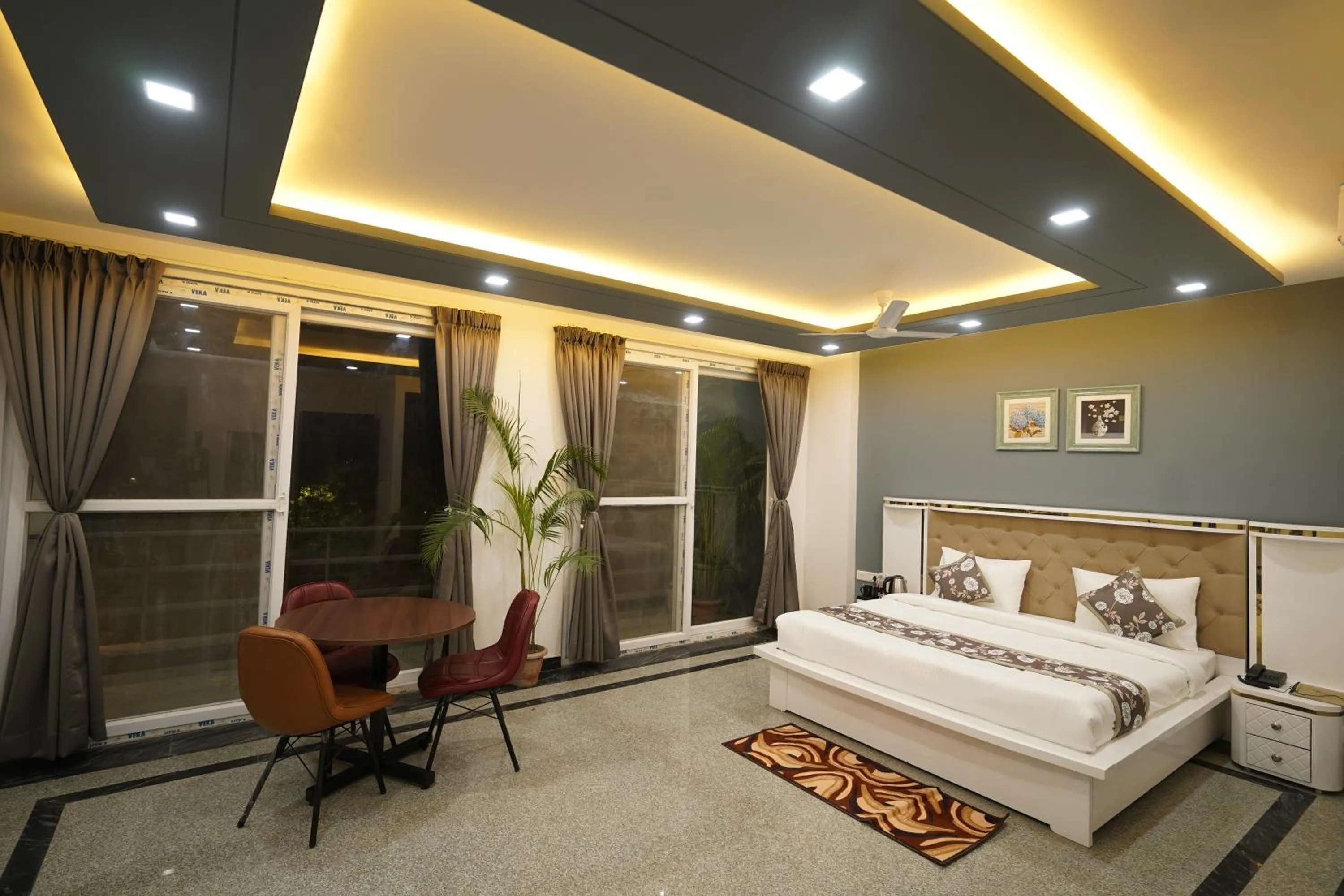 Photo of the whole room, Bed in Posh Garden Inn Artemis Hospital Road Gurgaon