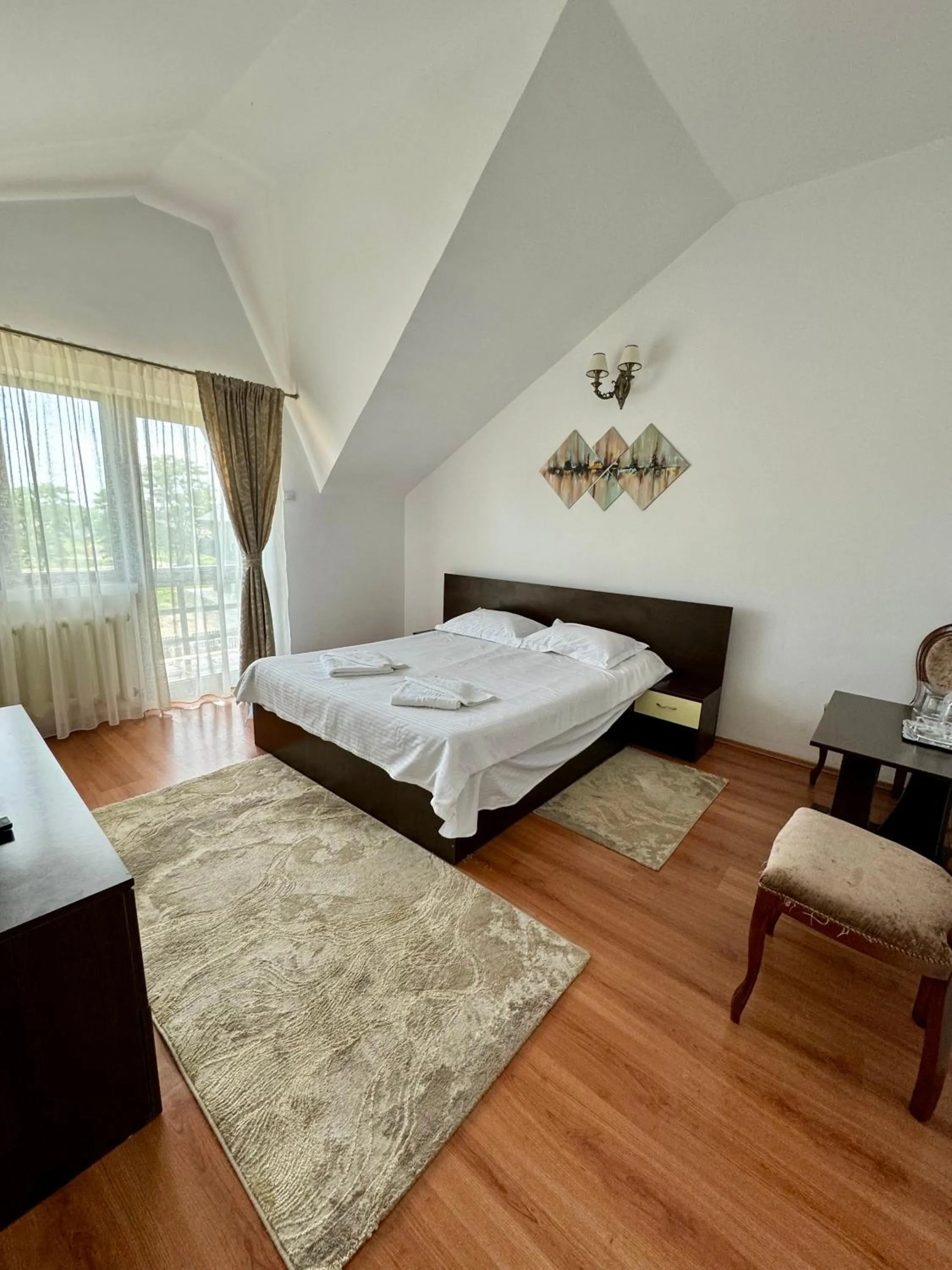 Bed in PENSIUNEA ANA