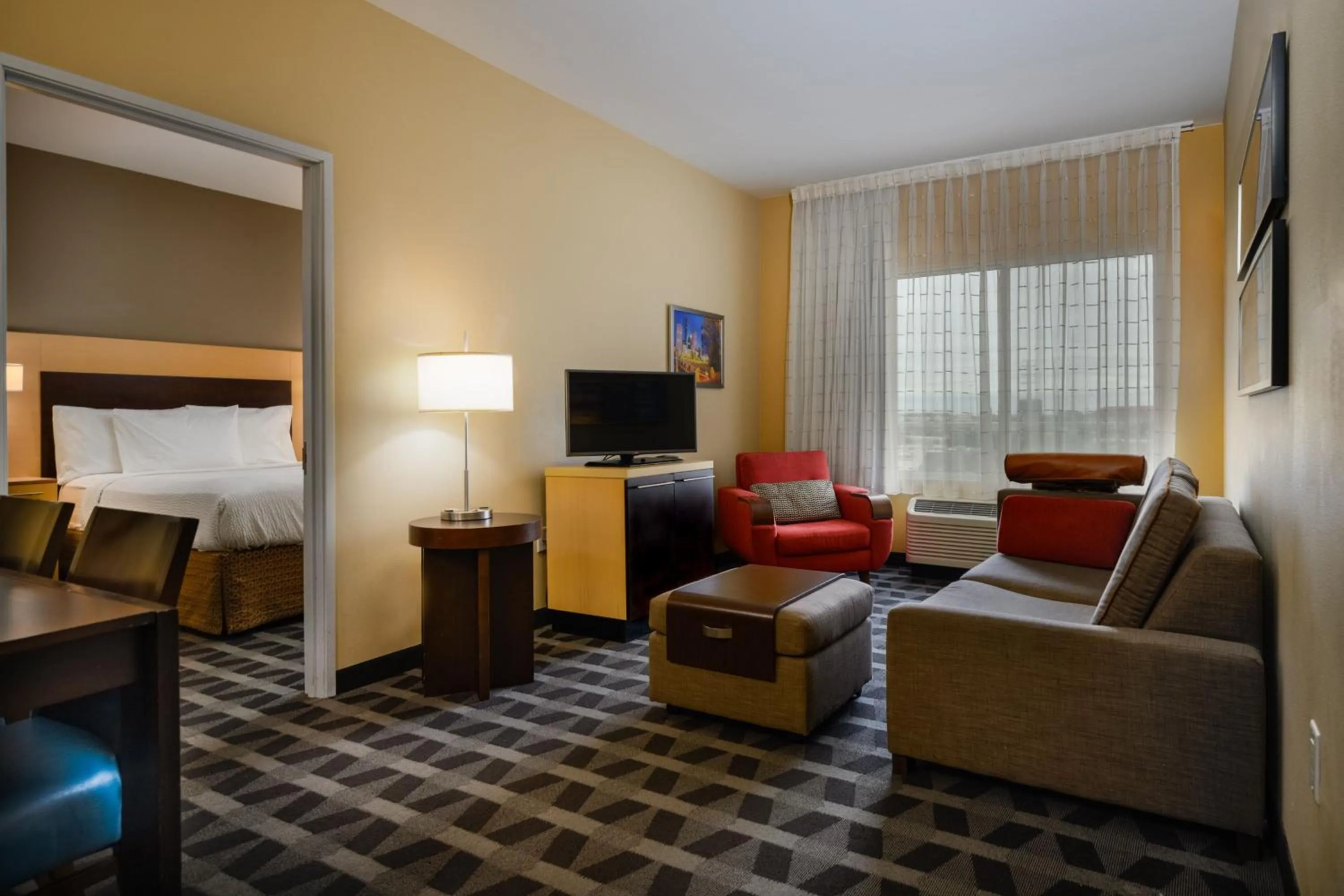 Living room, Bed in TownePlace Suites by Marriott Houston Westchase