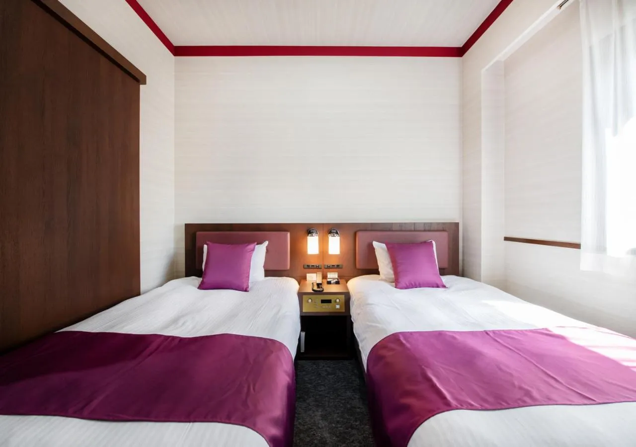 Bed in TKP Sunlife Hotel