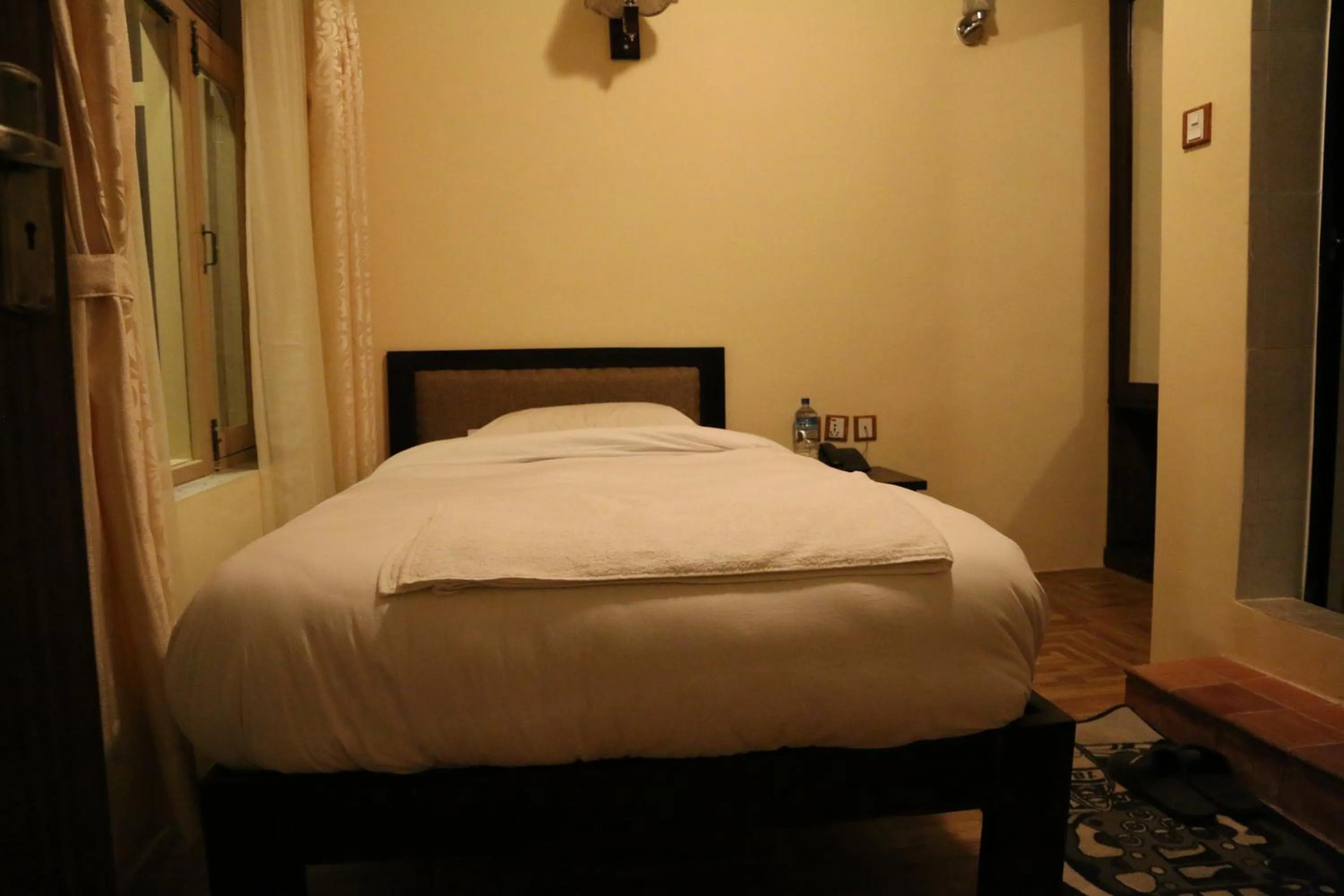 Bed in Boudha Stupa View Guest House