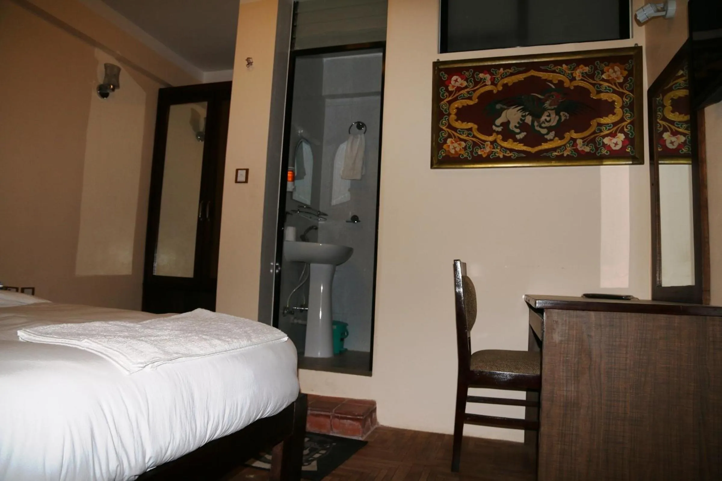 Bed in Boudha Stupa View Guest House