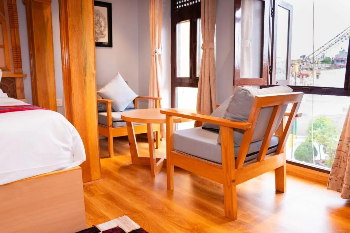 Seating area, Bed in Boudha Stupa View Guest House