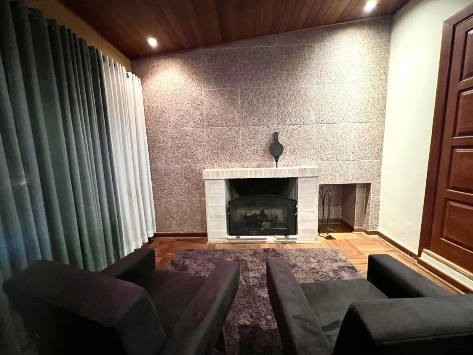 Communal lounge/ TV room, Bed in Recanto Ninho Verde Village