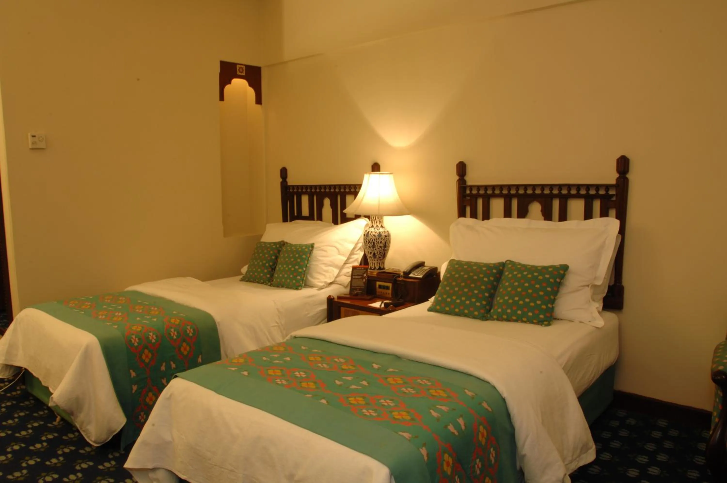 Bed in Faisalabad Serena Hotel
