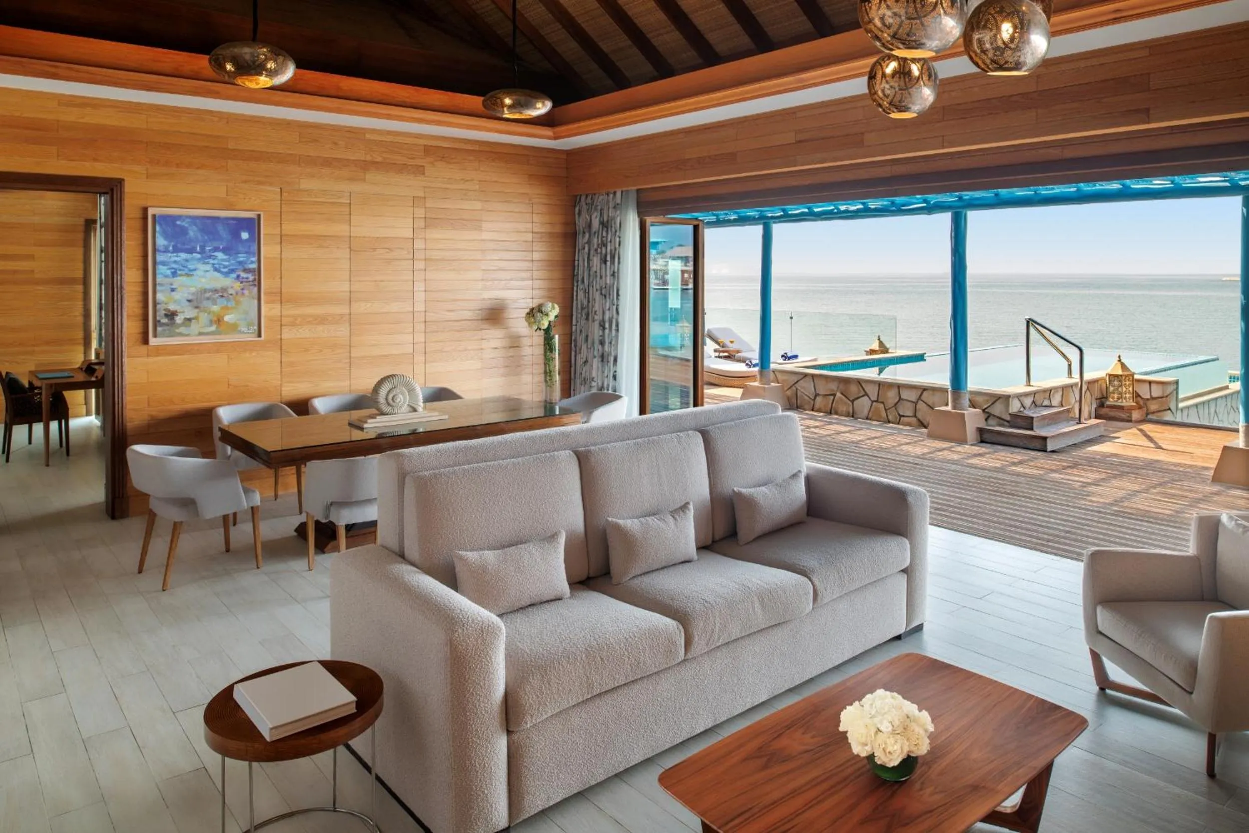 Living room in Banana Island Resort Doha by Anantara