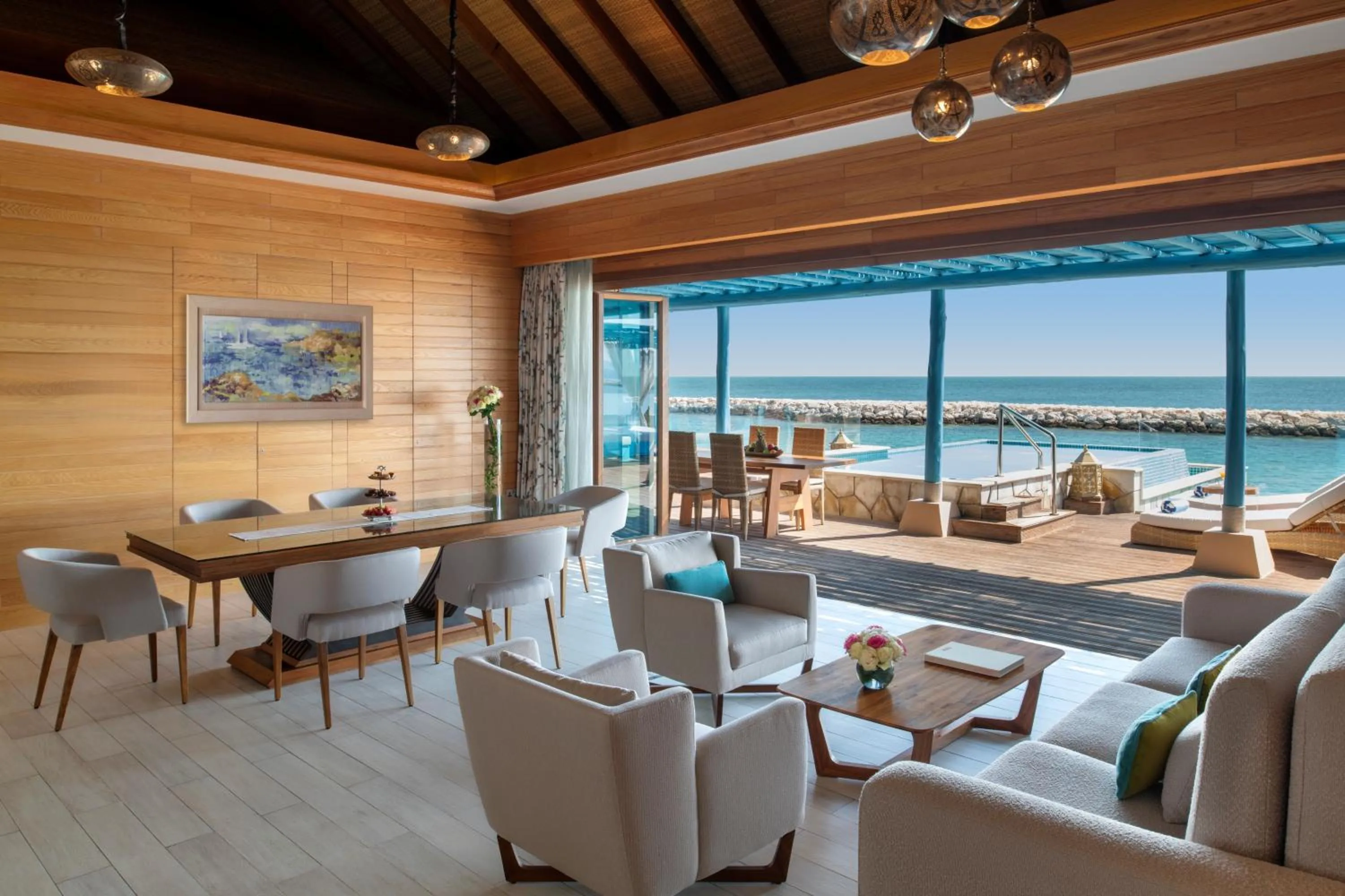 Living room in Banana Island Resort Doha by Anantara