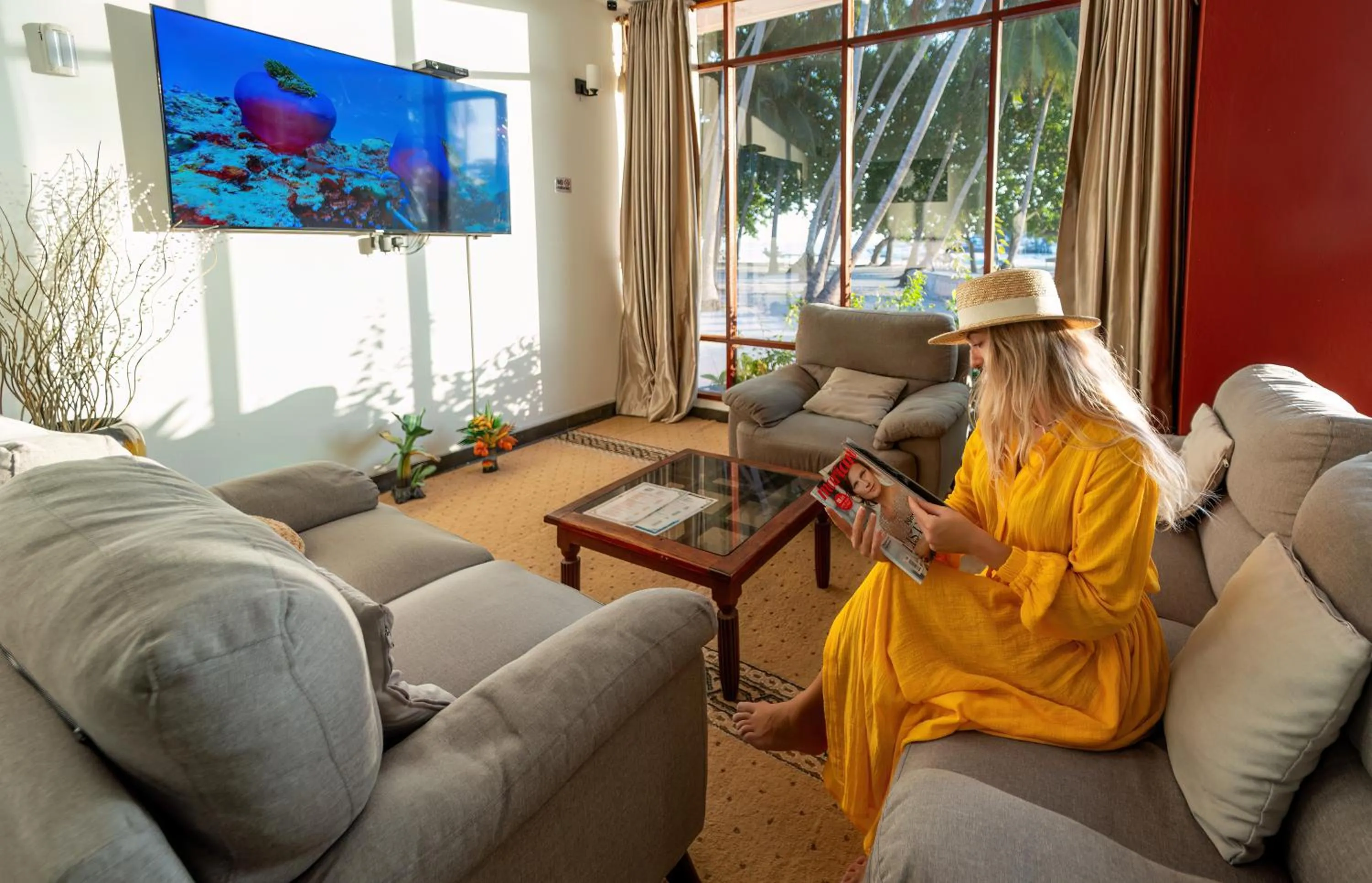 Communal lounge/ TV room in Silver Oasis Maldives