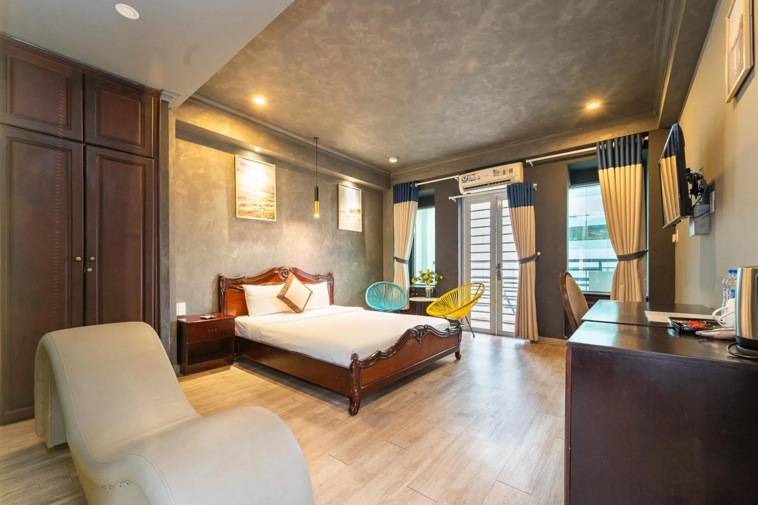 Photo of the whole room, Bed in Happy Homes Ben Thanh Central
