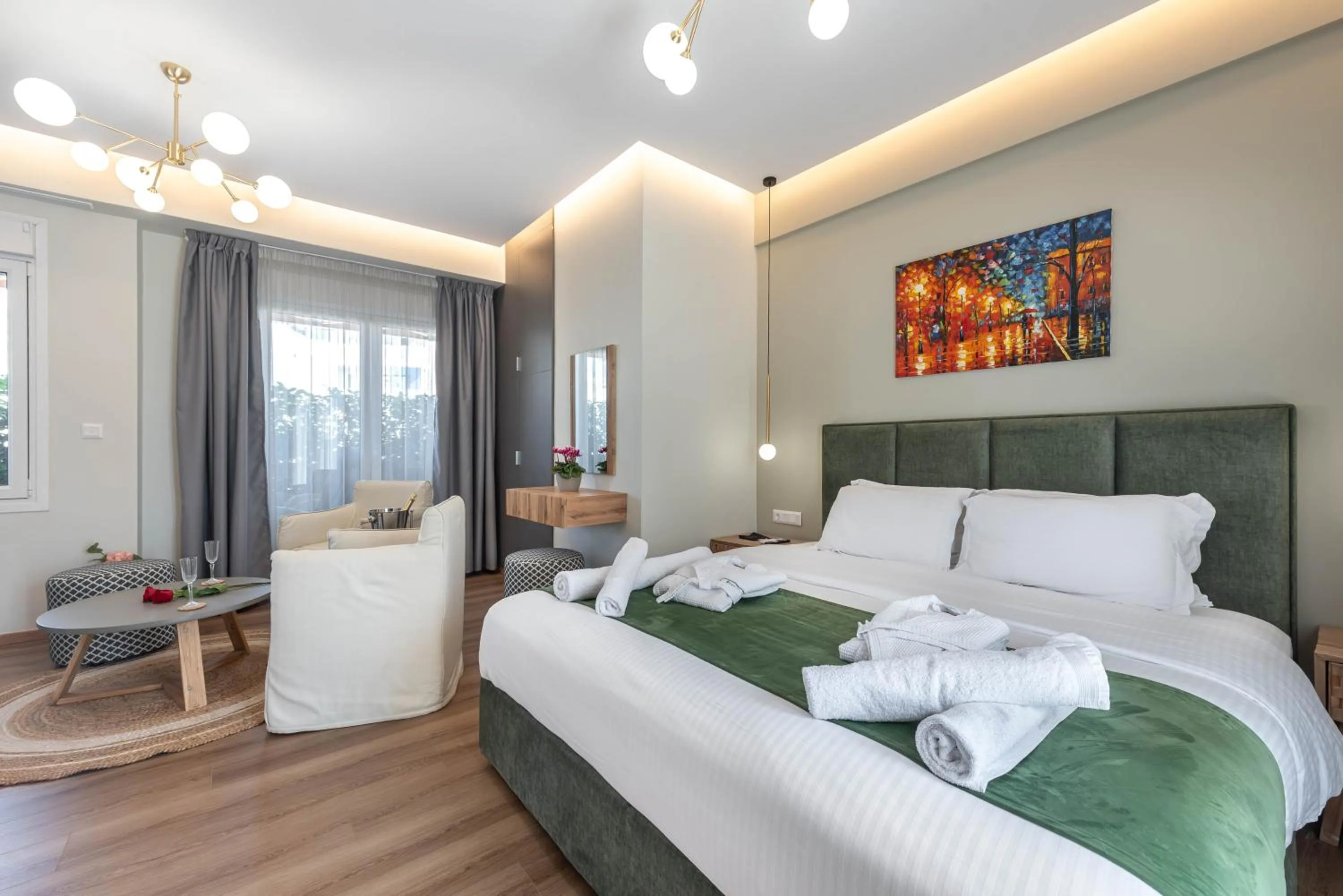 Bed in Acropolis Divine Apartments