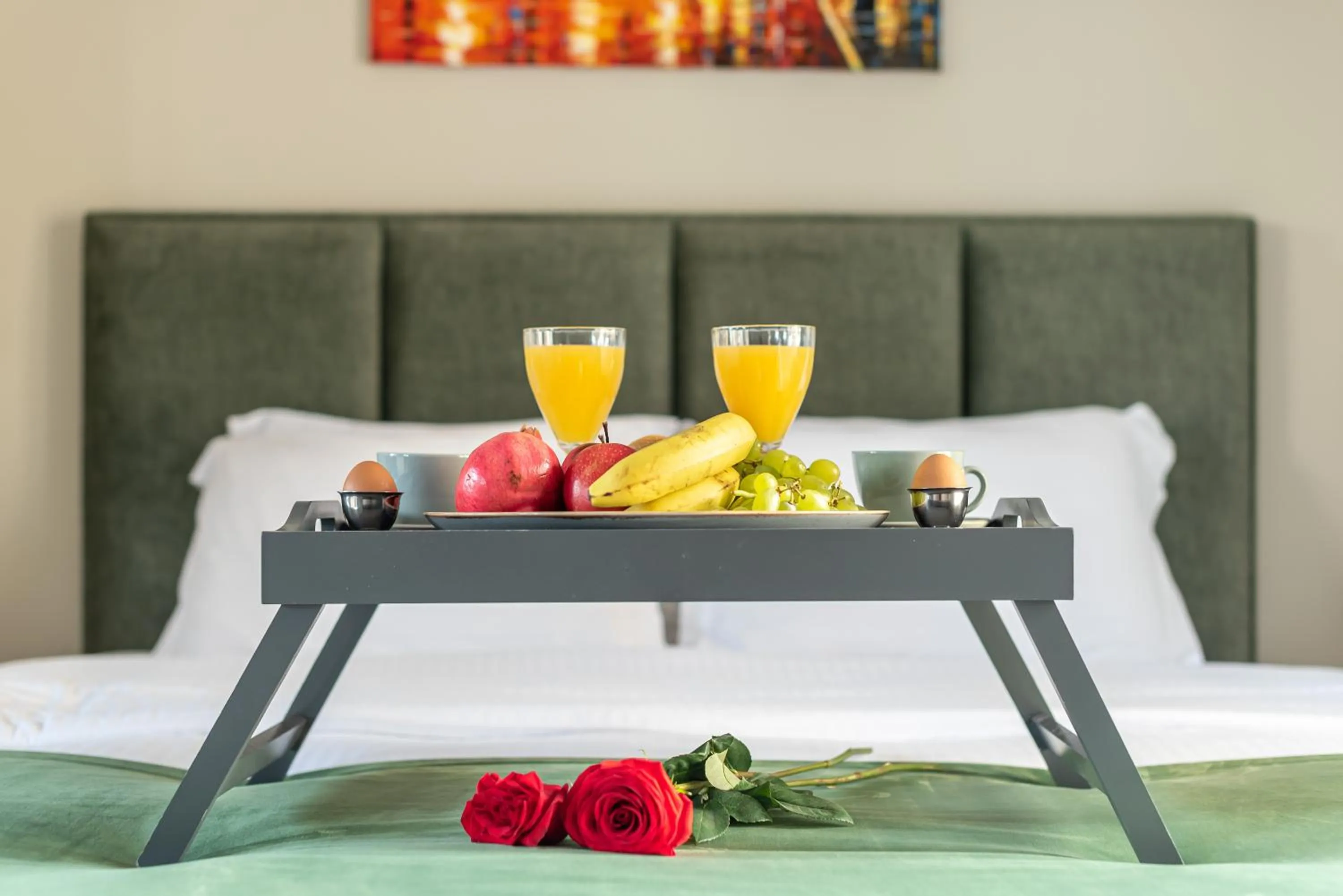 Bed in Acropolis Divine Apartments