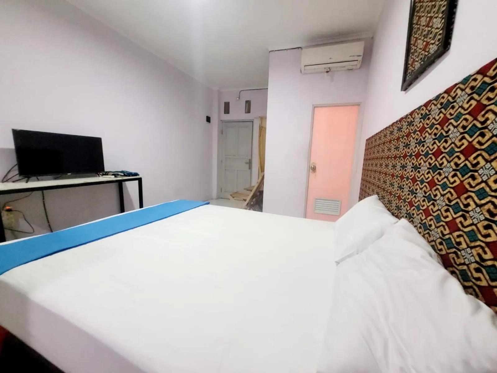 Bed in Wisma Gahalta by Fans