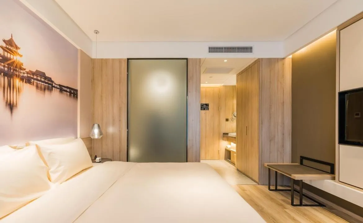 Bed in Atour Hotel Wuxi Sanyang Plaza