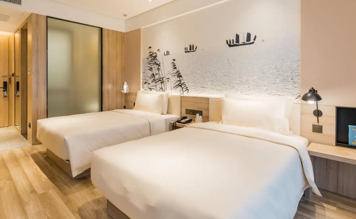 Bed in Atour Hotel Wuxi Sanyang Plaza