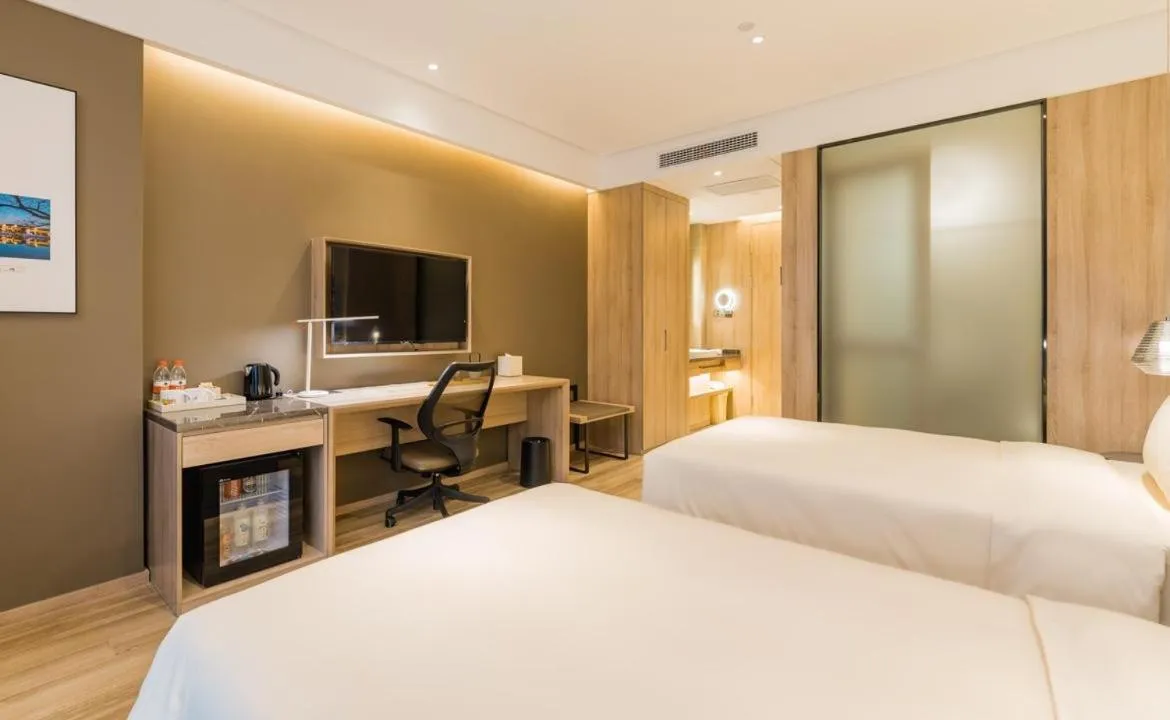 Bed in Atour Hotel Wuxi Sanyang Plaza