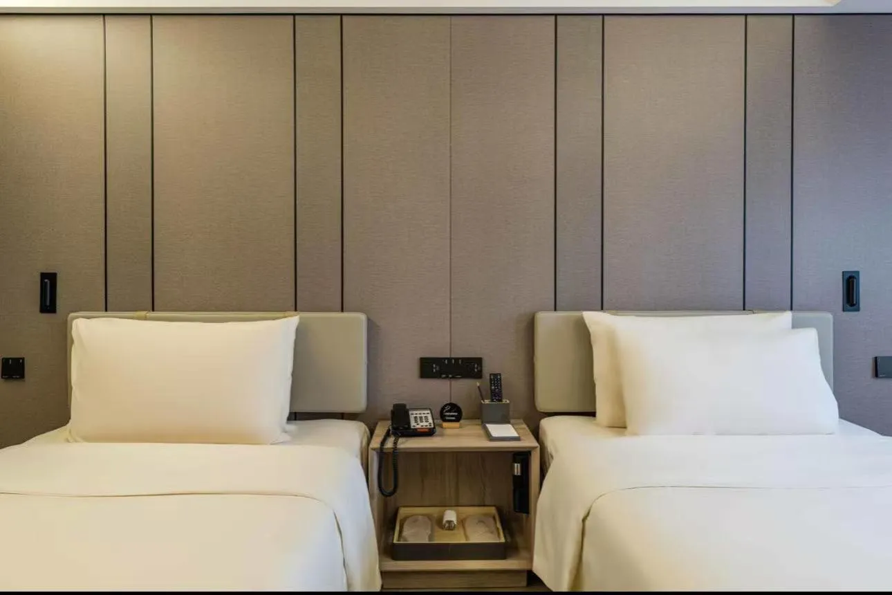 Bed in Atour Music Hotel Hangzhou West Lake