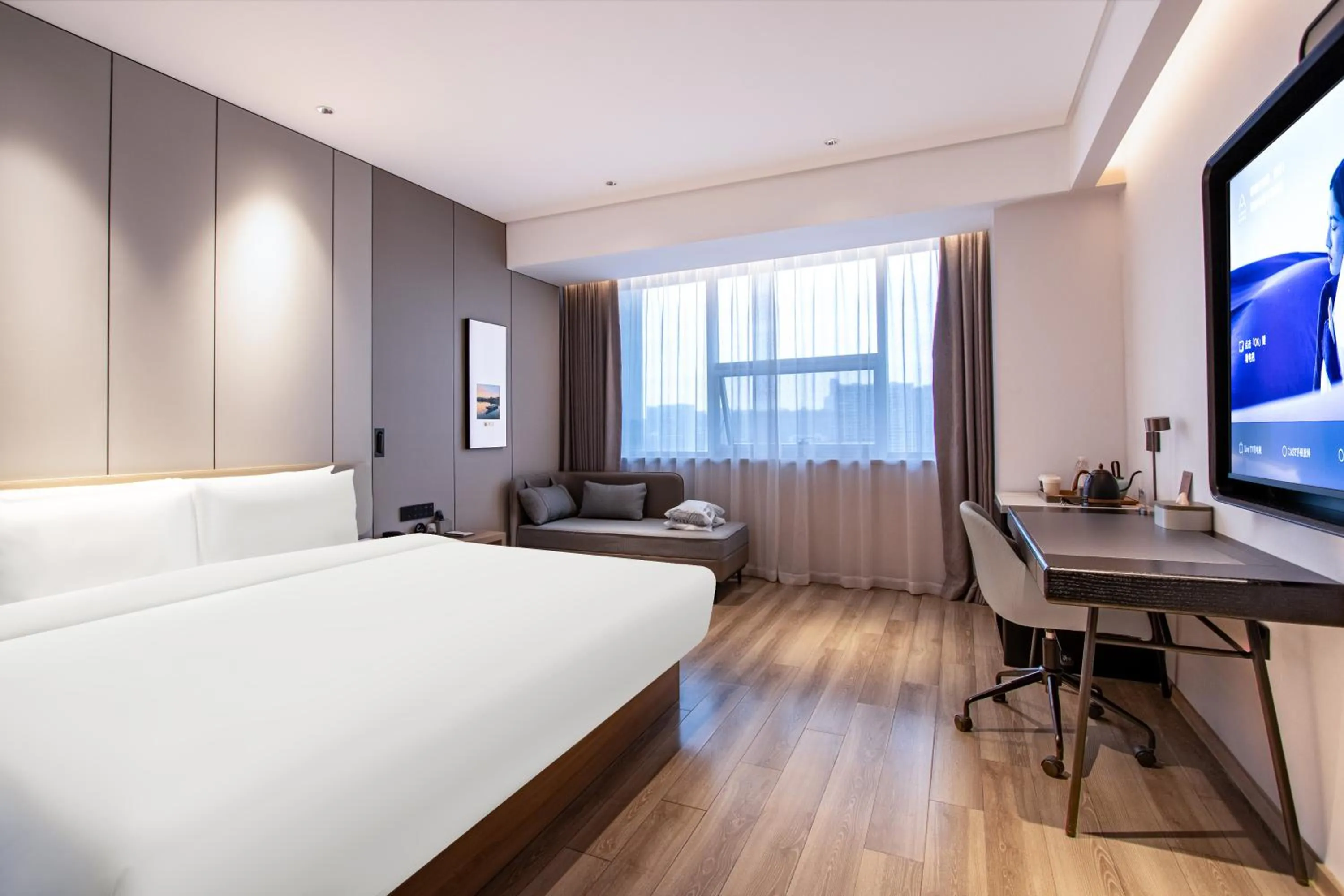 Photo of the whole room, Bed in Atour Hotel Hangzhou Xiaoshan Peoples Square