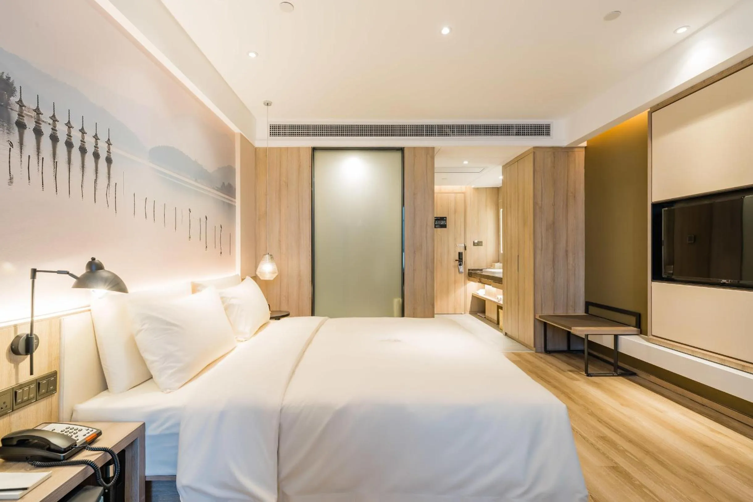 Bed in Atour Hotel Ningbo International Convention and Exhibition Center