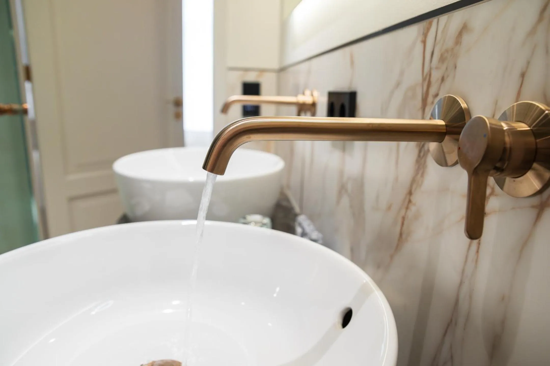 Bathroom in Ambassade Hotel