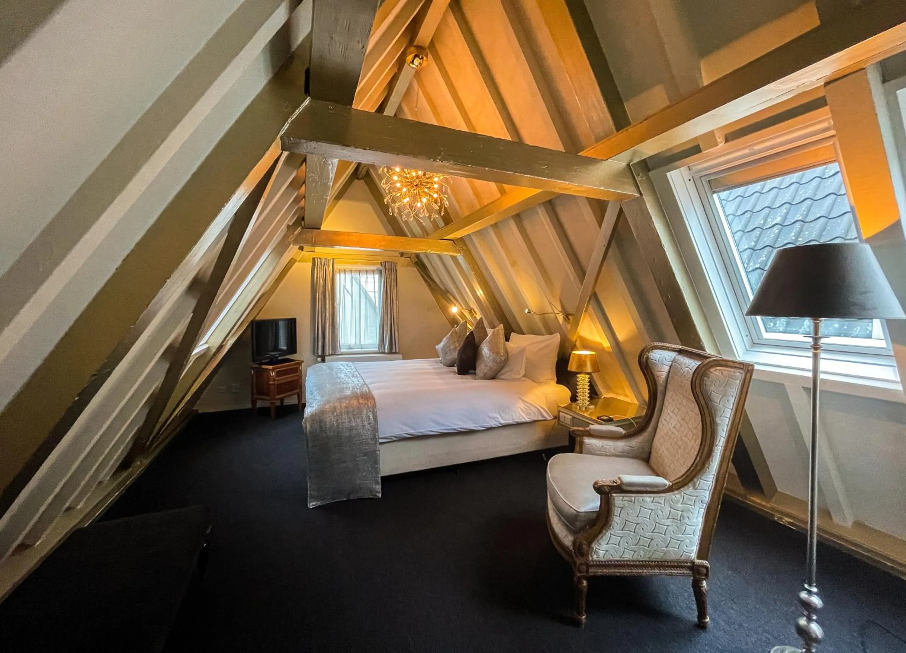 Bed in Ambassade Hotel