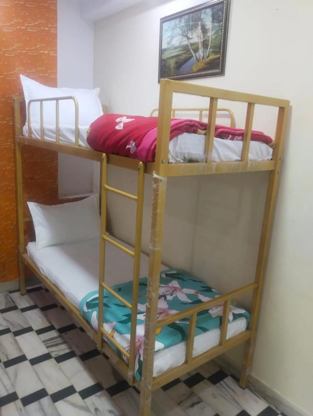 Bed in HOTEL HAYAT RESIDENCY
