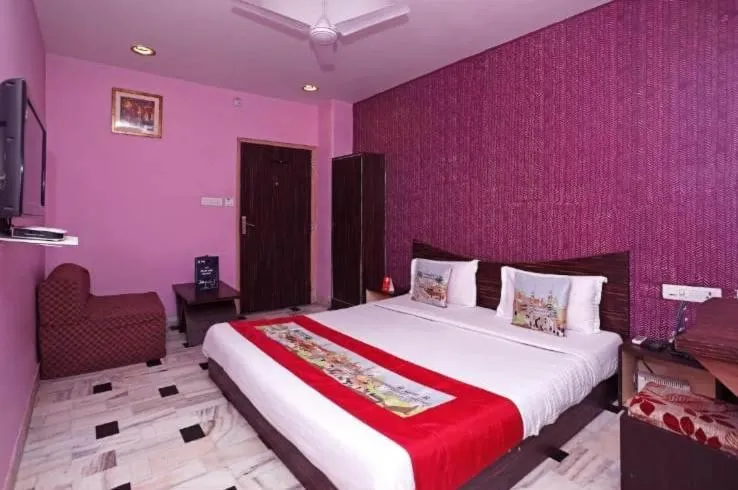 Bed in HOTEL HAYAT RESIDENCY
