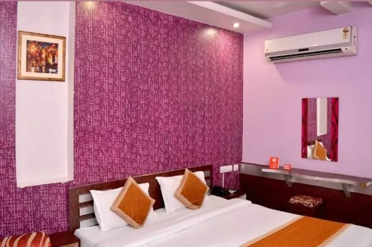 Bed in HOTEL HAYAT RESIDENCY