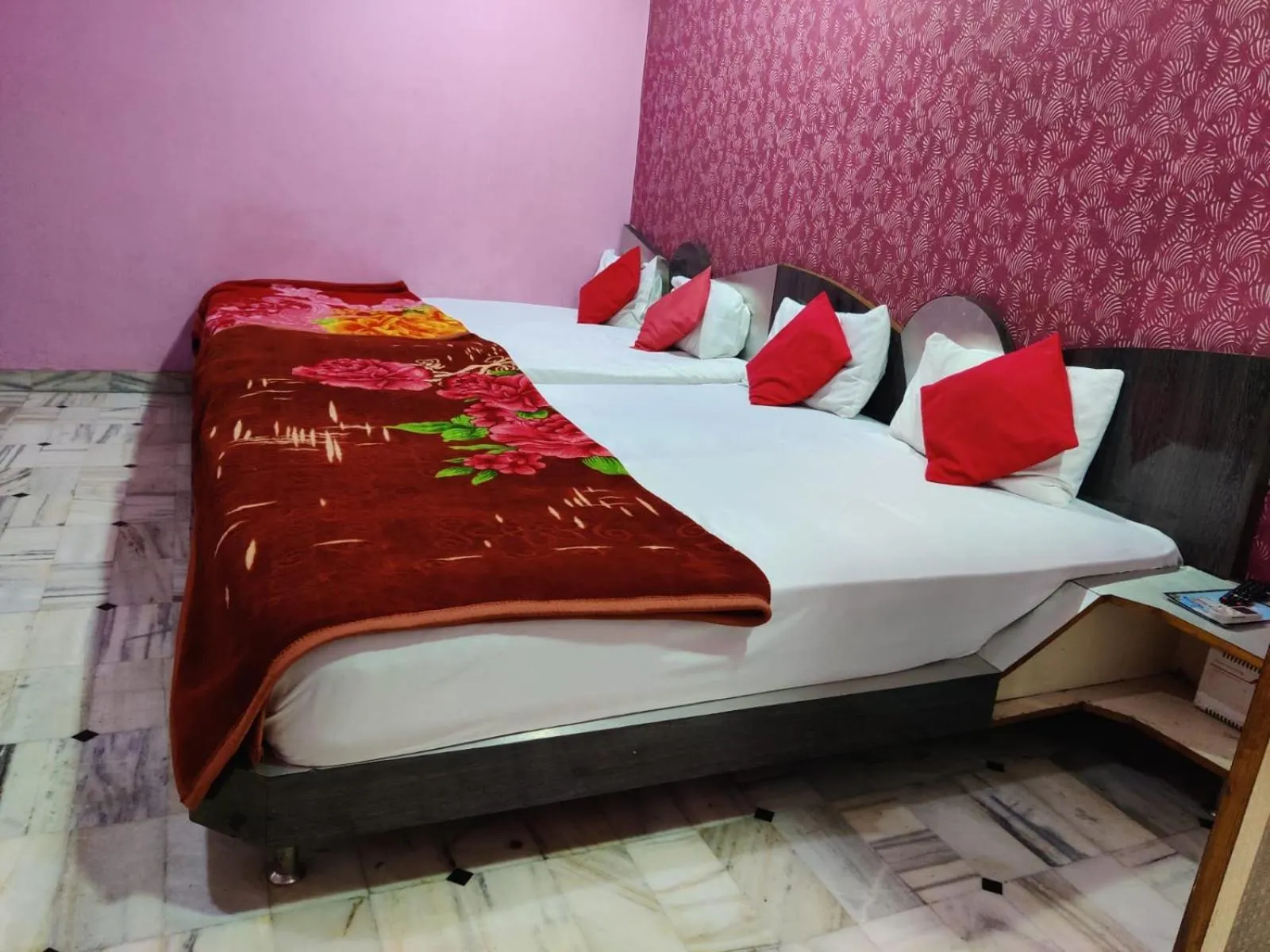 Bed in HOTEL HAYAT RESIDENCY