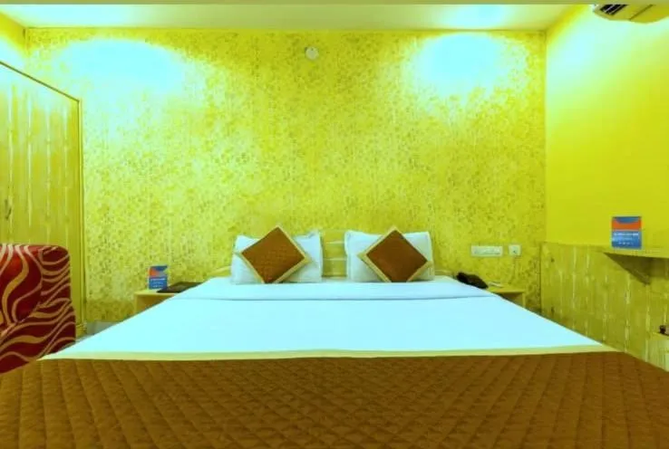 Bed in HOTEL HAYAT RESIDENCY
