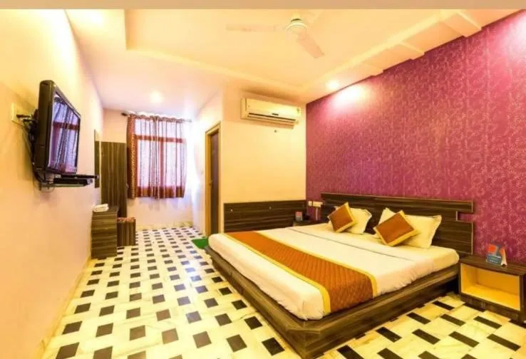 Bed in HOTEL HAYAT RESIDENCY