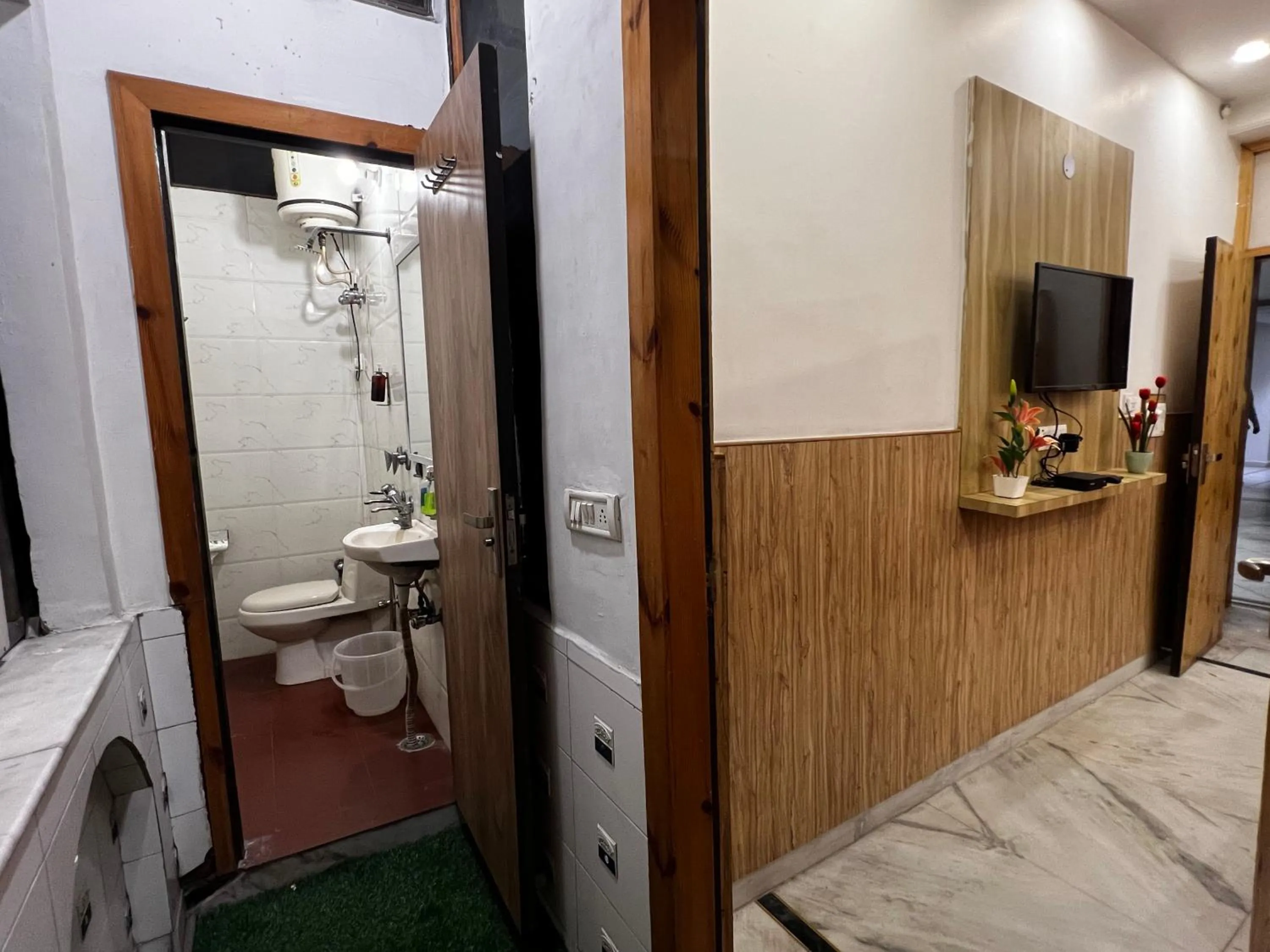 Shower in Divine Inn Hotel Near Rajouri Garden Main Market