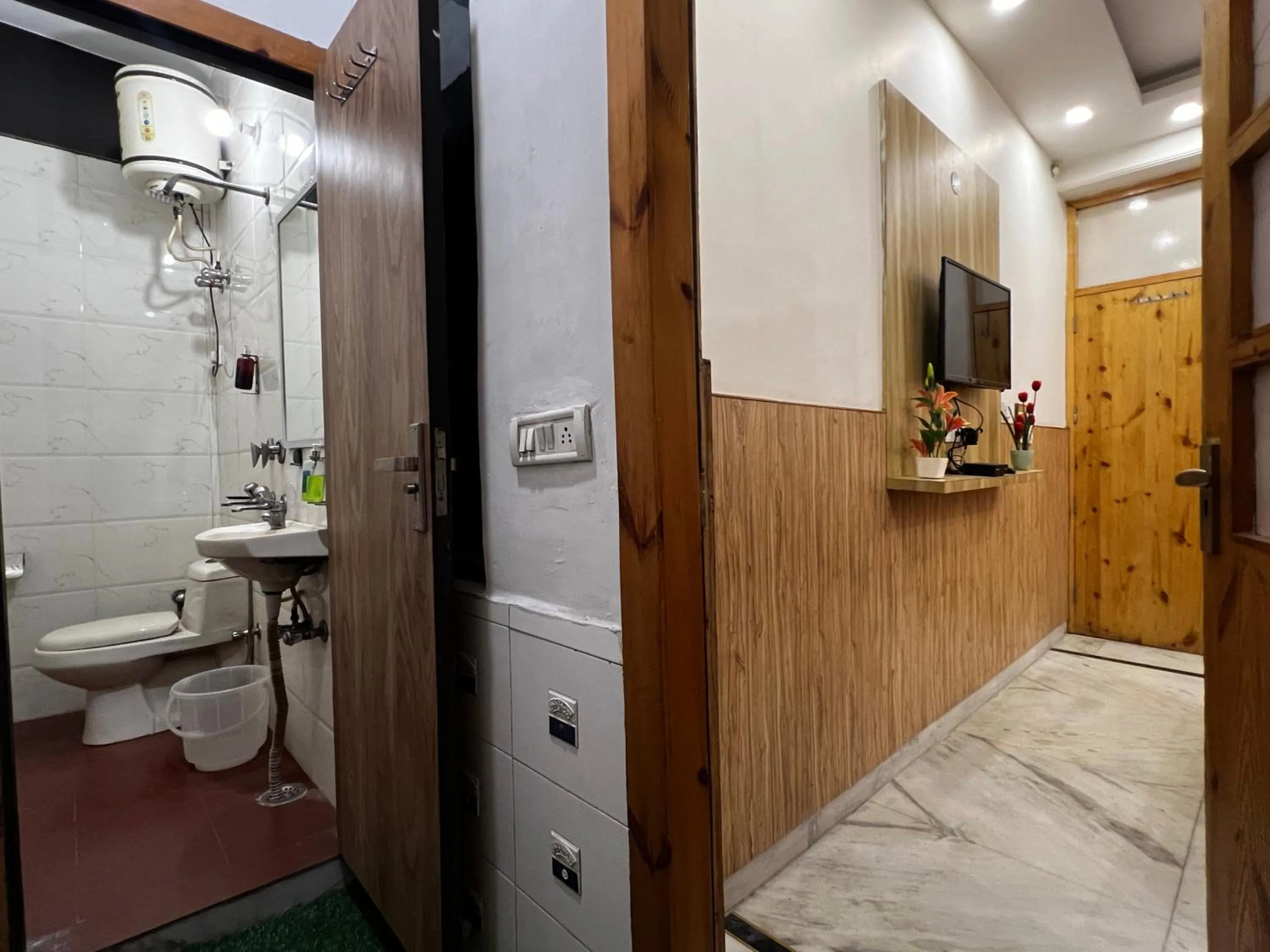 Shower in Divine Inn Hotel Near Rajouri Garden Main Market