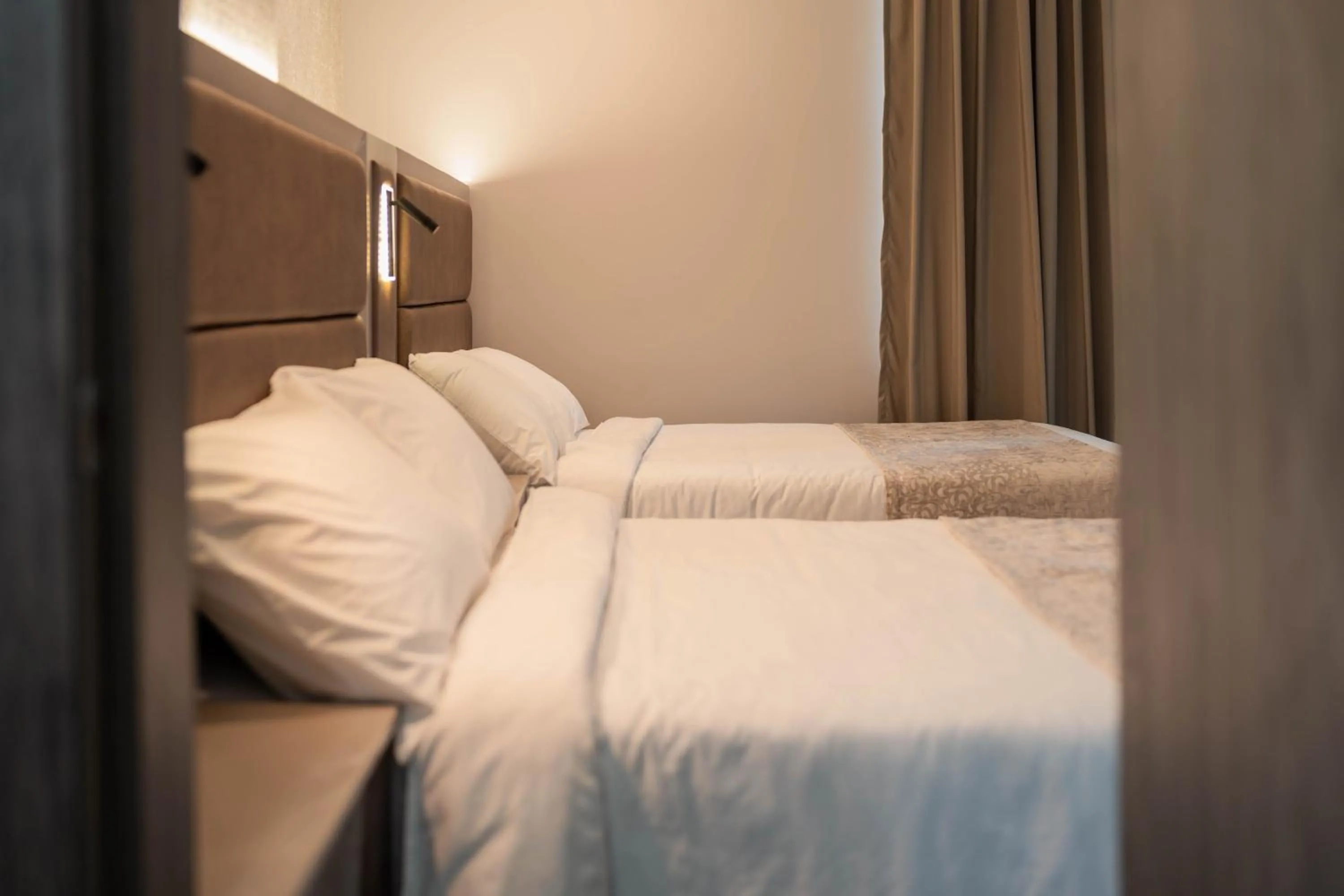 Bed in Amari Living Suites