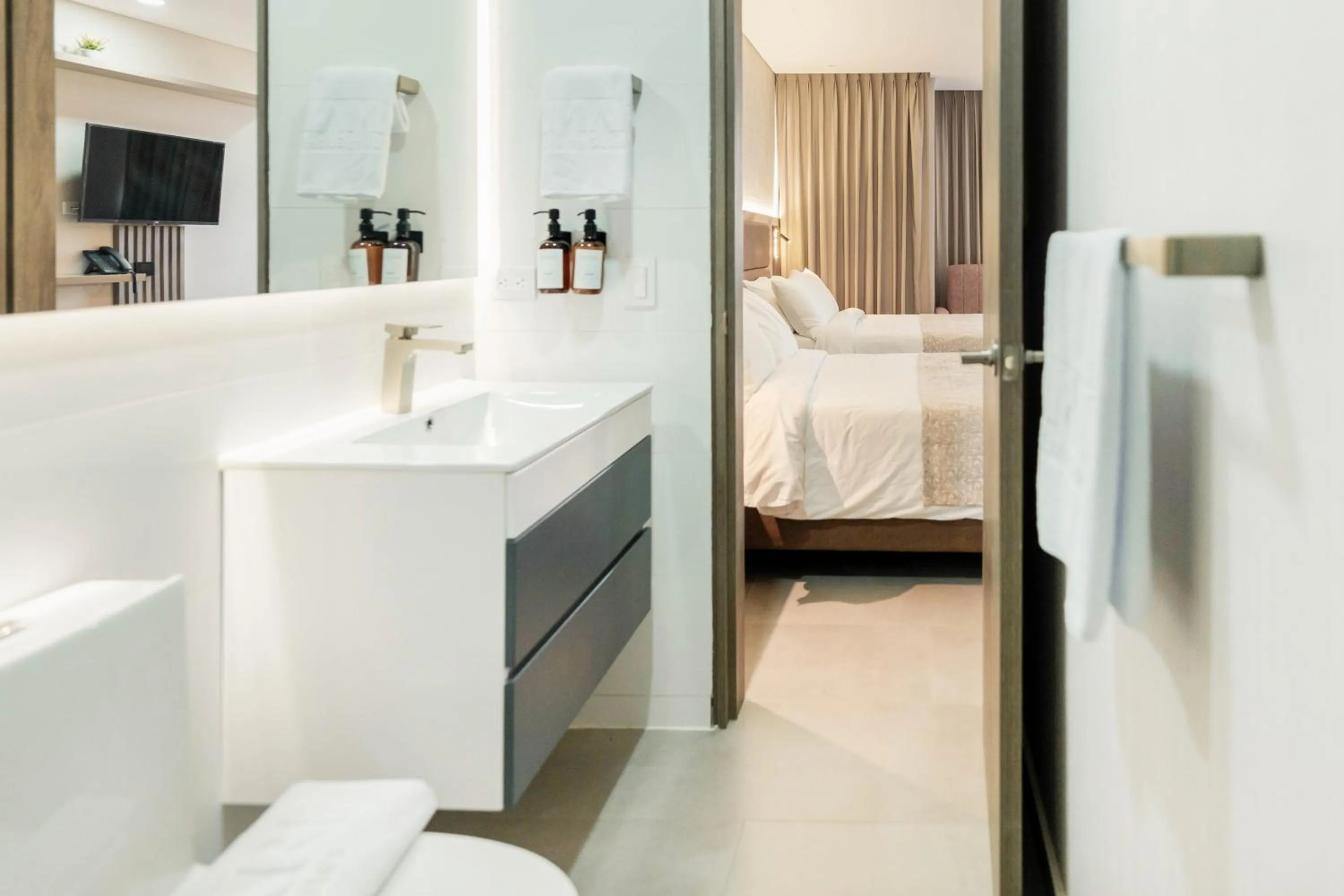 Bed in Amari Living Suites