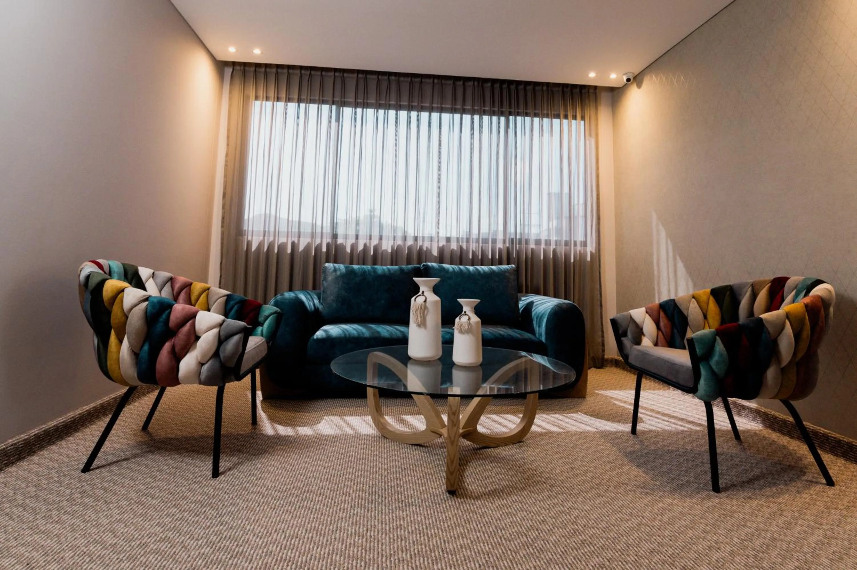 Communal lounge/ TV room in Amari Living Suites