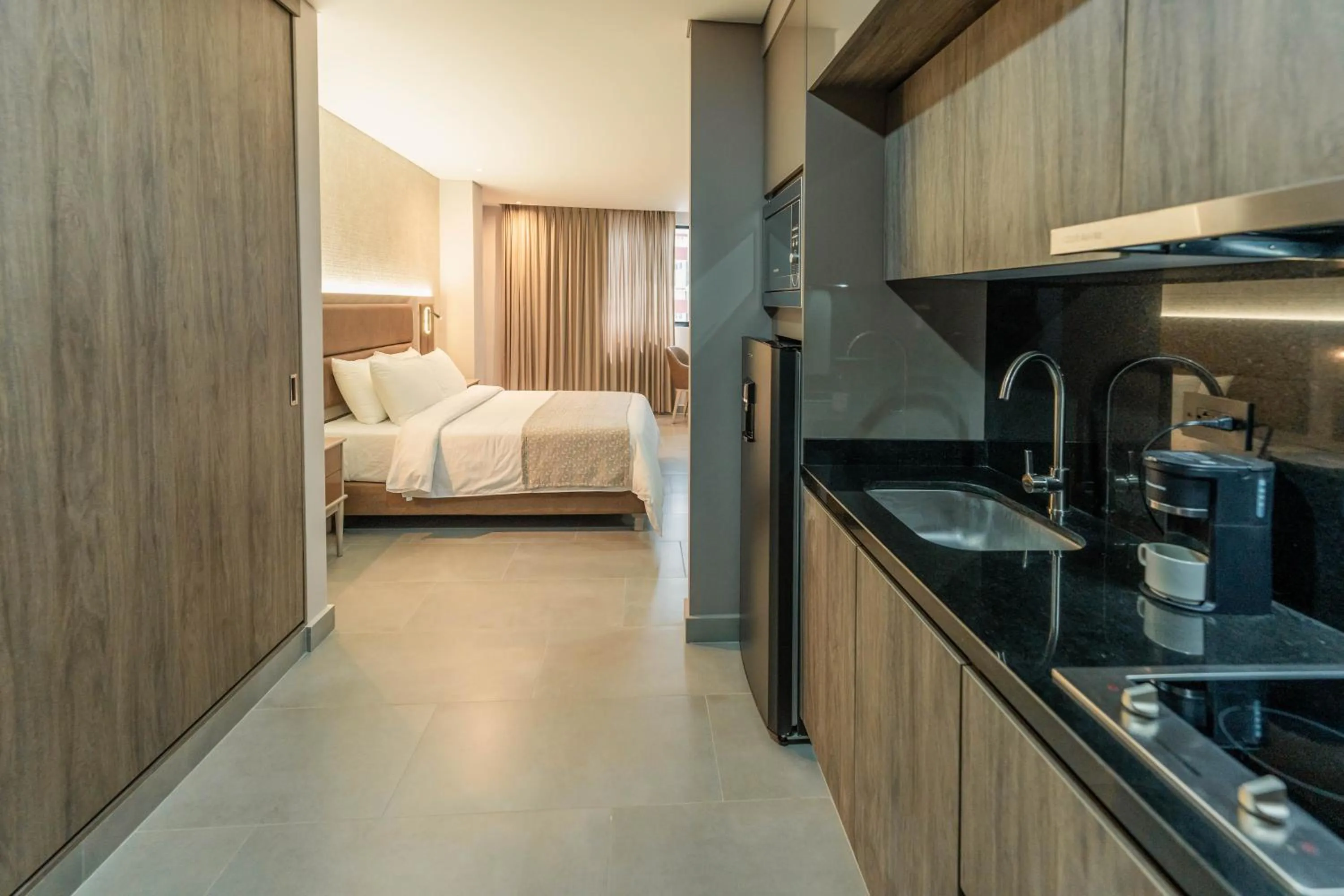 Coffee/tea facilities, Bed in Amari Living Suites