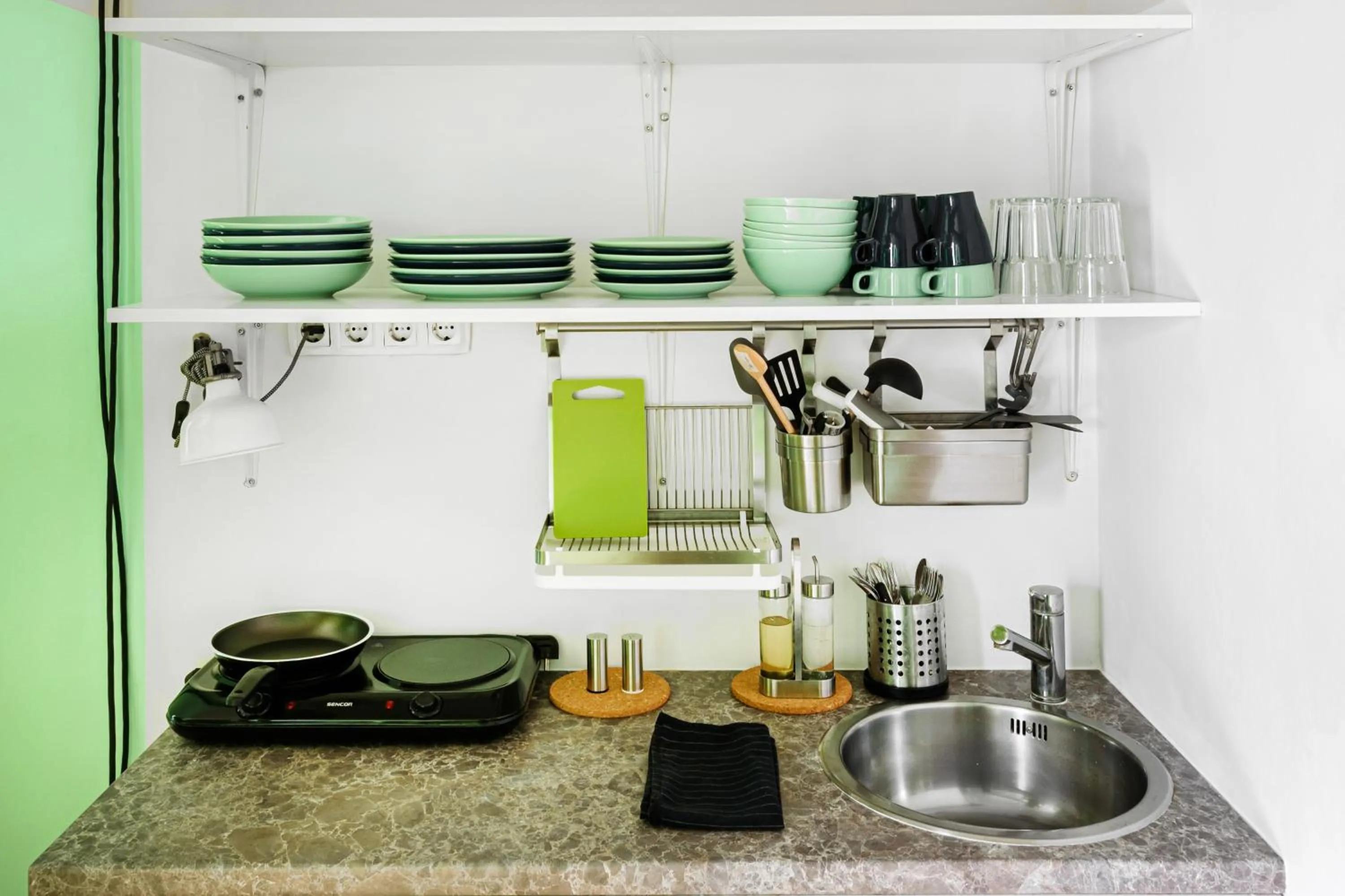 Kitchen or kitchenette in Avenue Hostel