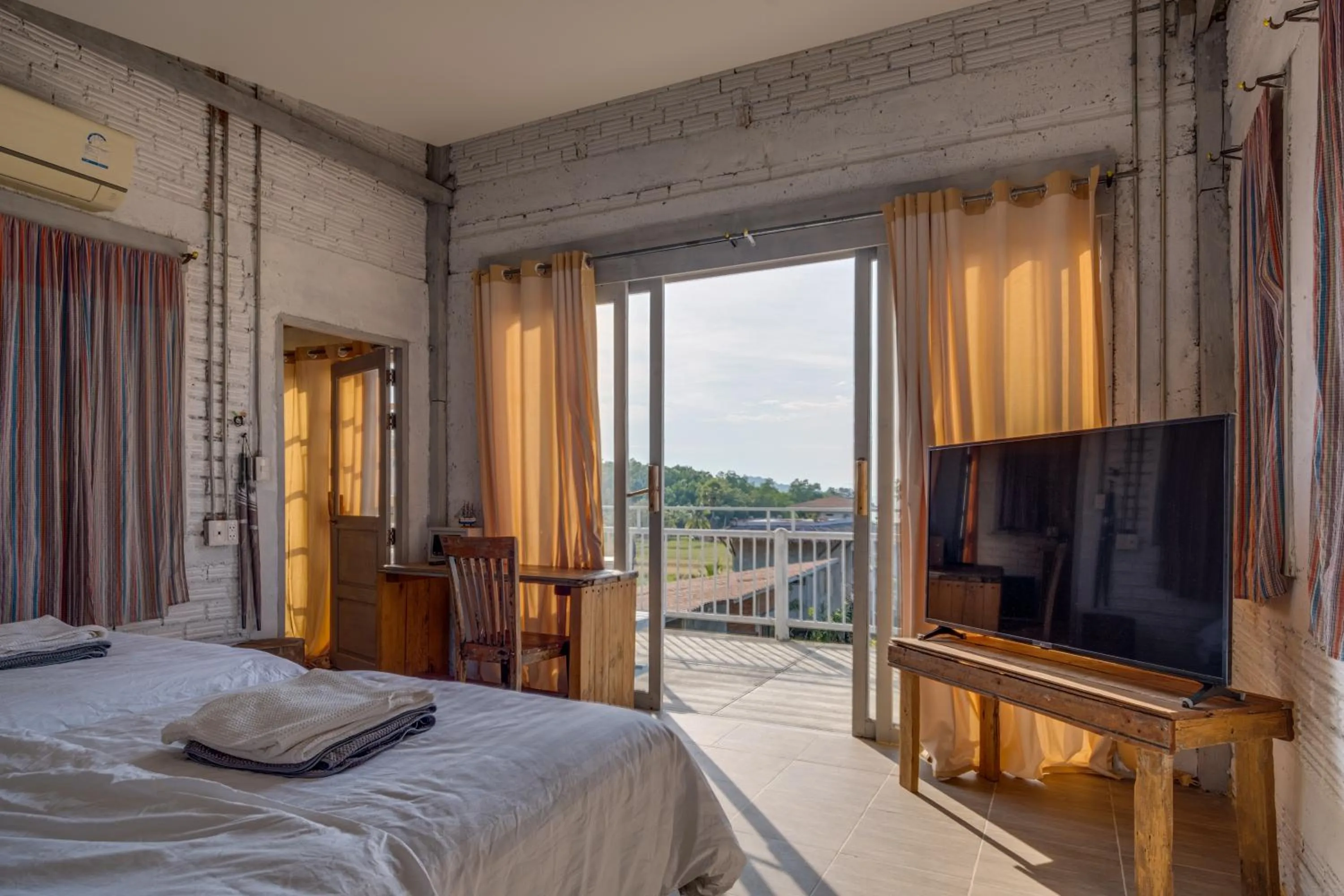 Bed in Artisan koh yao yai handcraft beachfront villas.