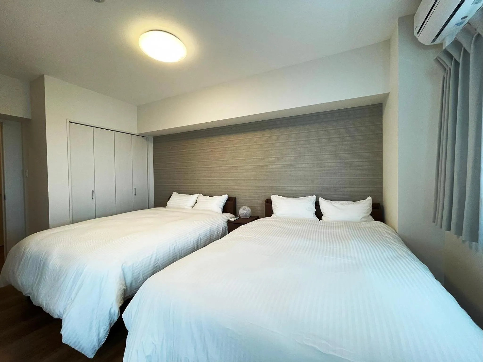 Bedroom, Bed in ＆Monde. Okinawa Arena Condominium