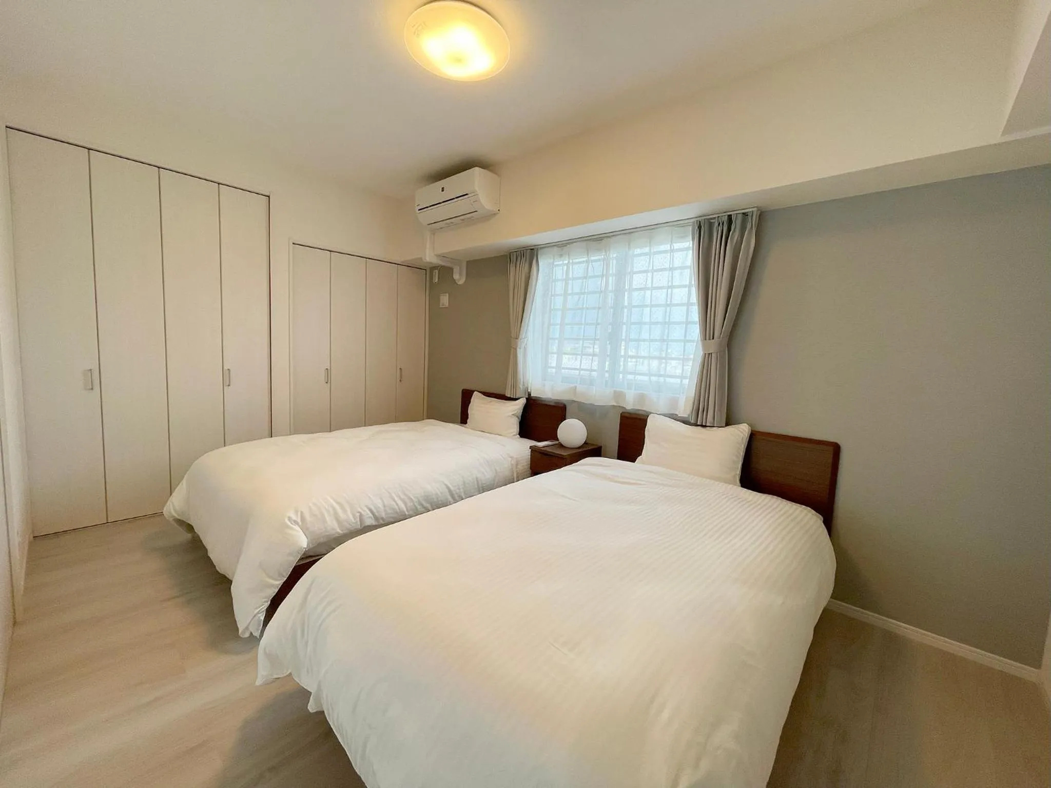 Bed in ＆Monde. Okinawa Arena Condominium