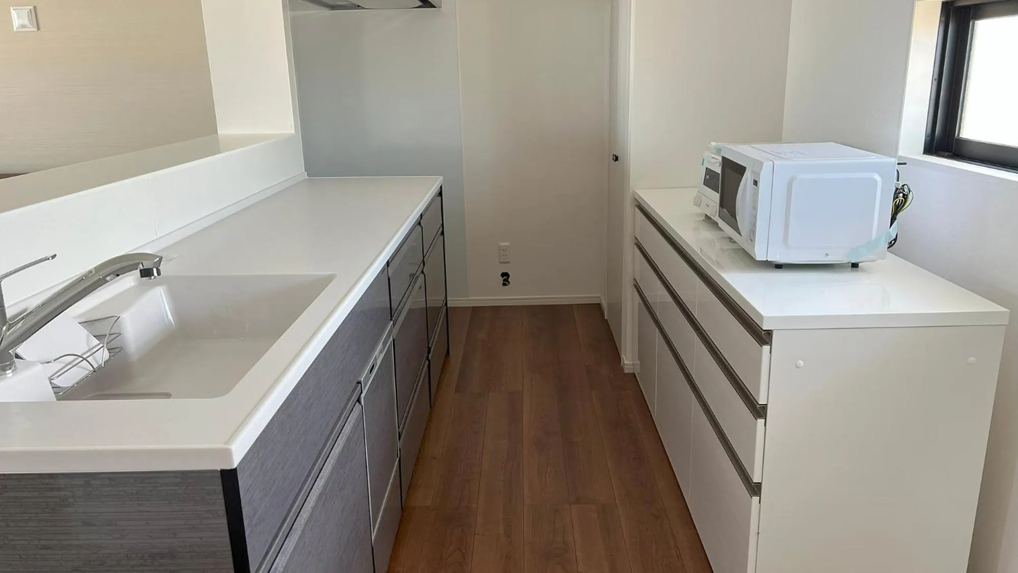 Kitchen or kitchenette in ＆Monde. Okinawa Arena Condominium