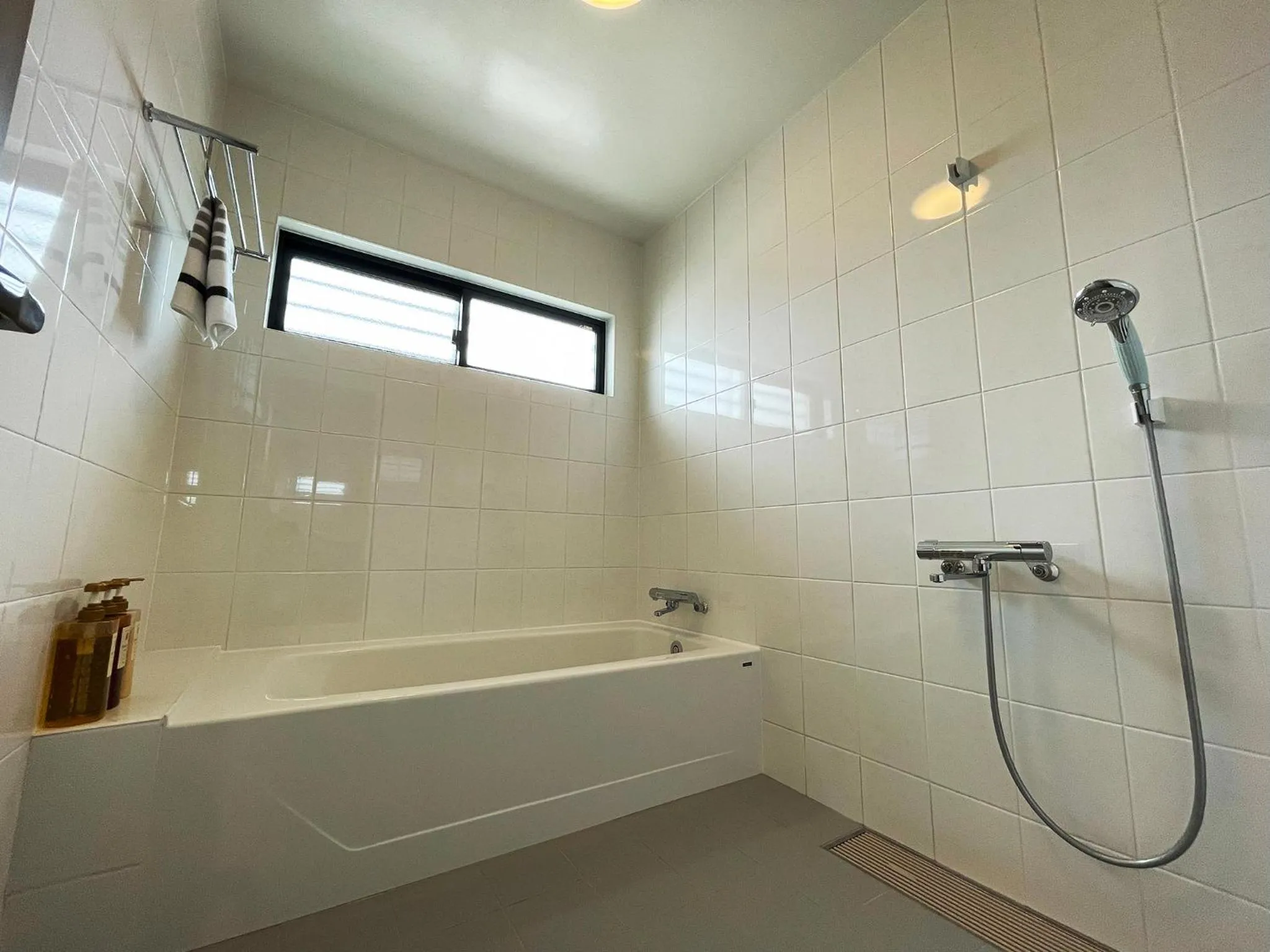 Bathroom in ＆Monde. Okinawa Arena Condominium