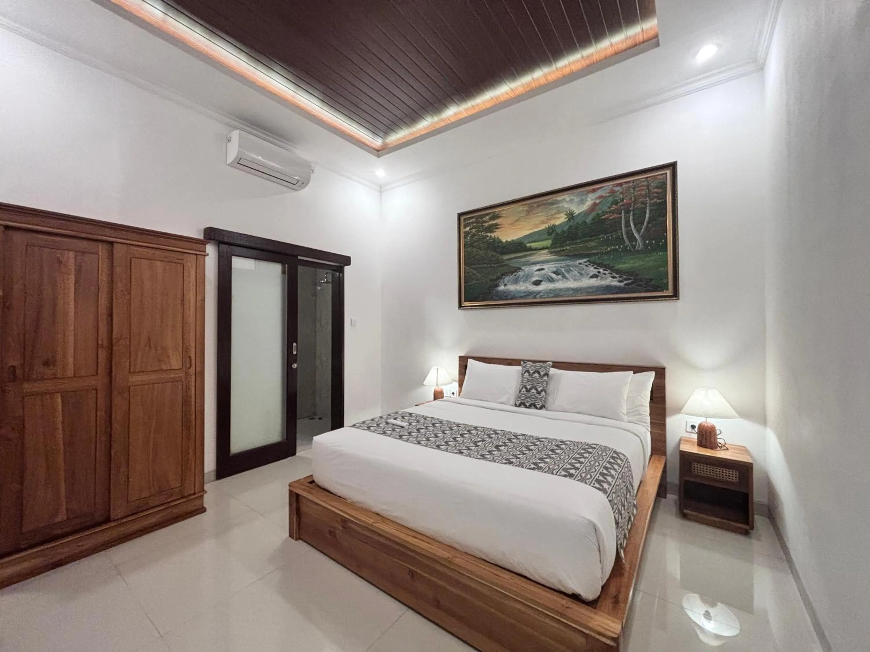 Bed in Arvanya Villa Ubud