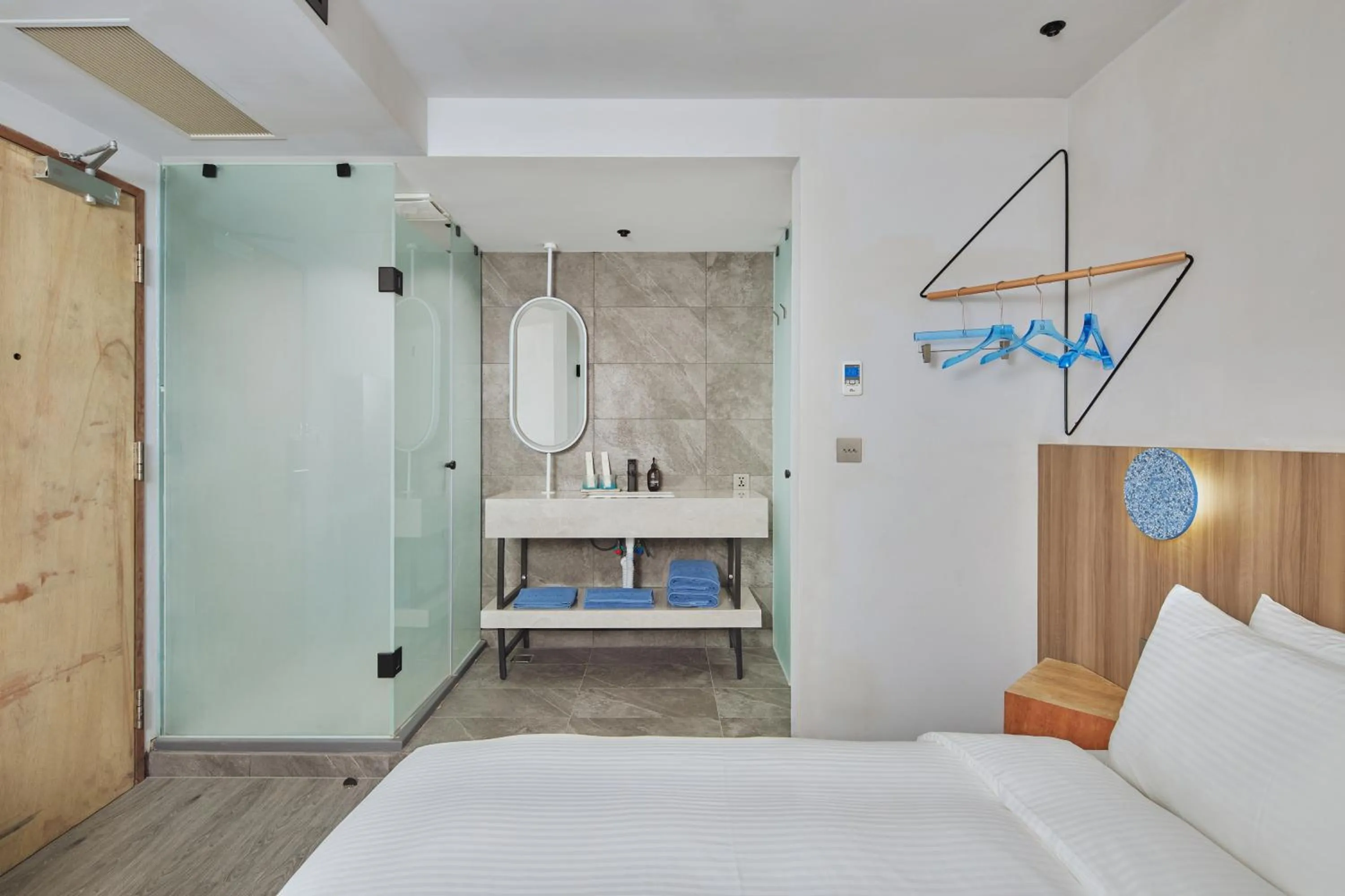 Shower, Bed in The Blue by Just Inn