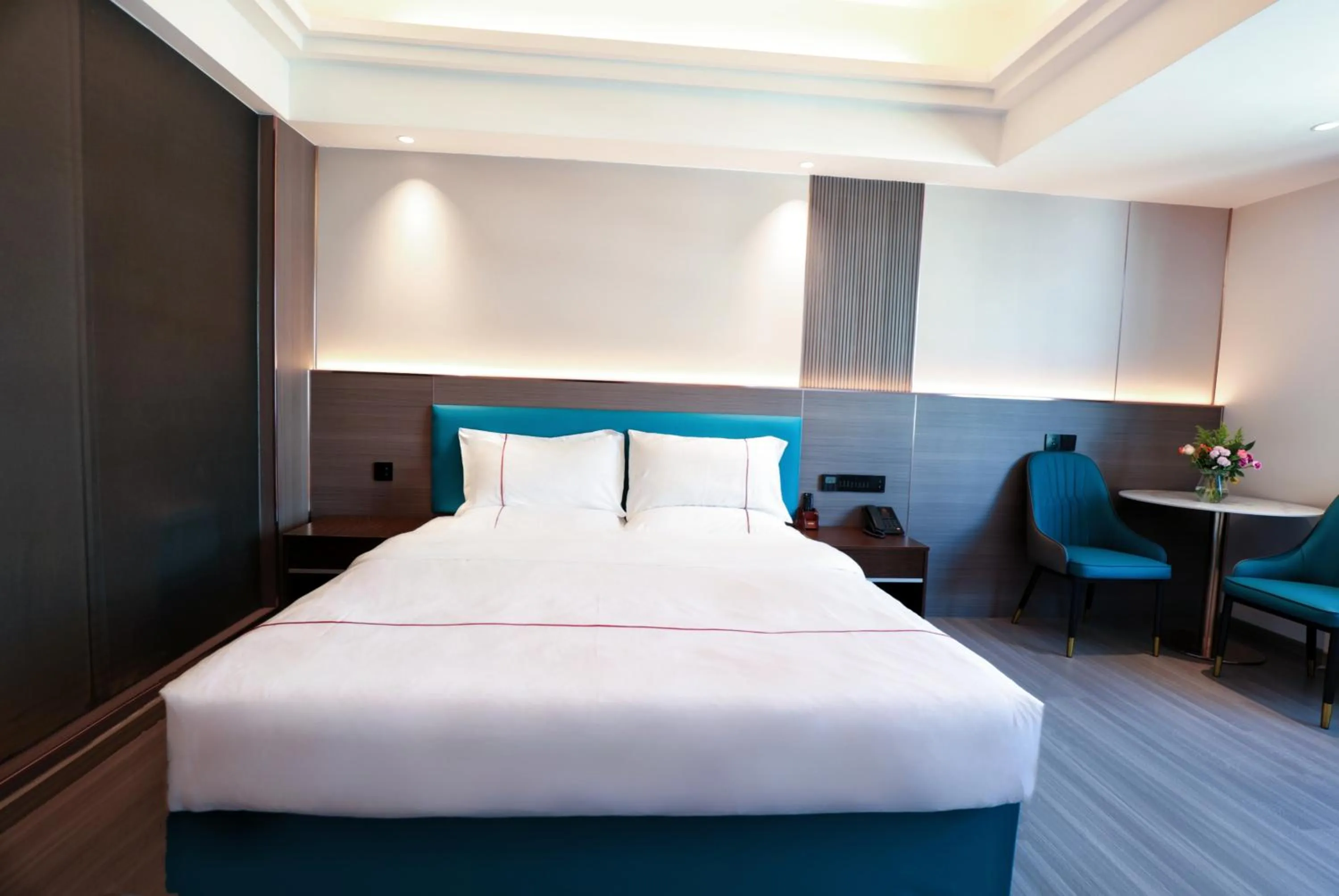 Bed in Mei Gang Hotel